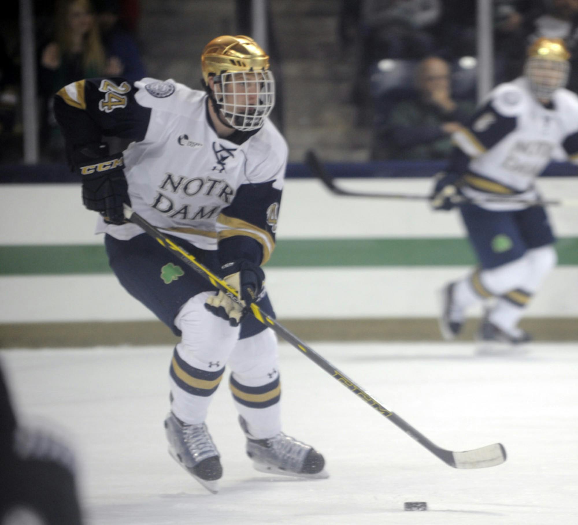 Irish freshman defenseman Luke Ripley looks for an opening during Notre Dame’s exhibition game against Waterloo on Sunday.