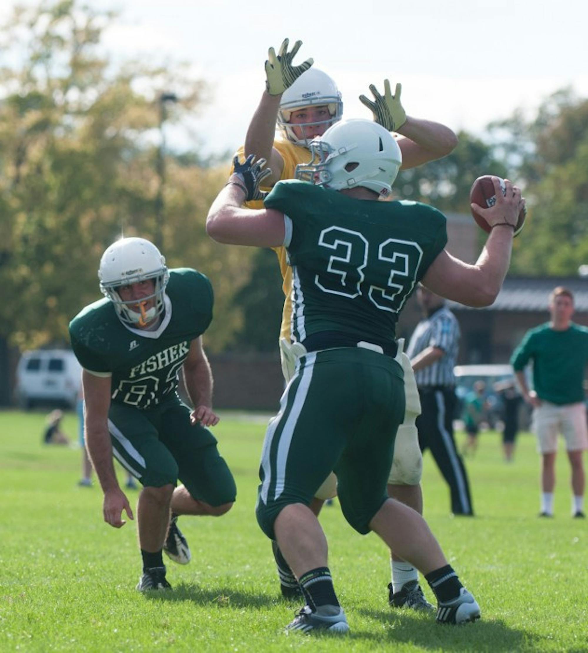 Junior Patrick Mazza of Sorin, defensive lineman, rushes the passer in a game last year. Mazza is now a varsity football walk-on.
