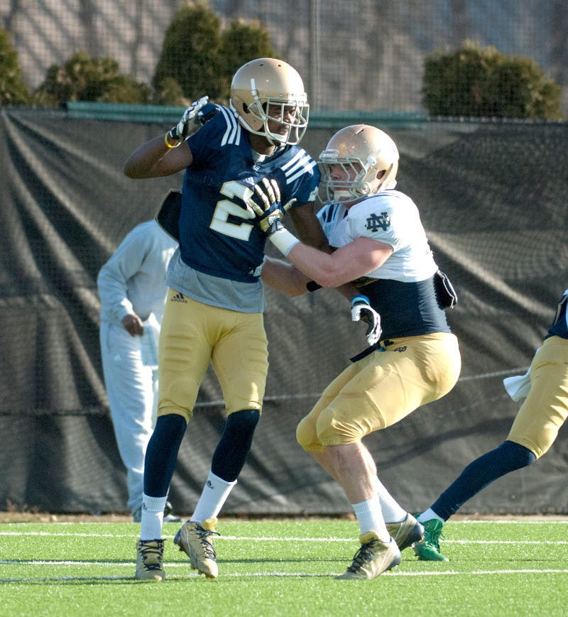 1397172161-20140409-Football-Practice-Brown-Michael-Yu