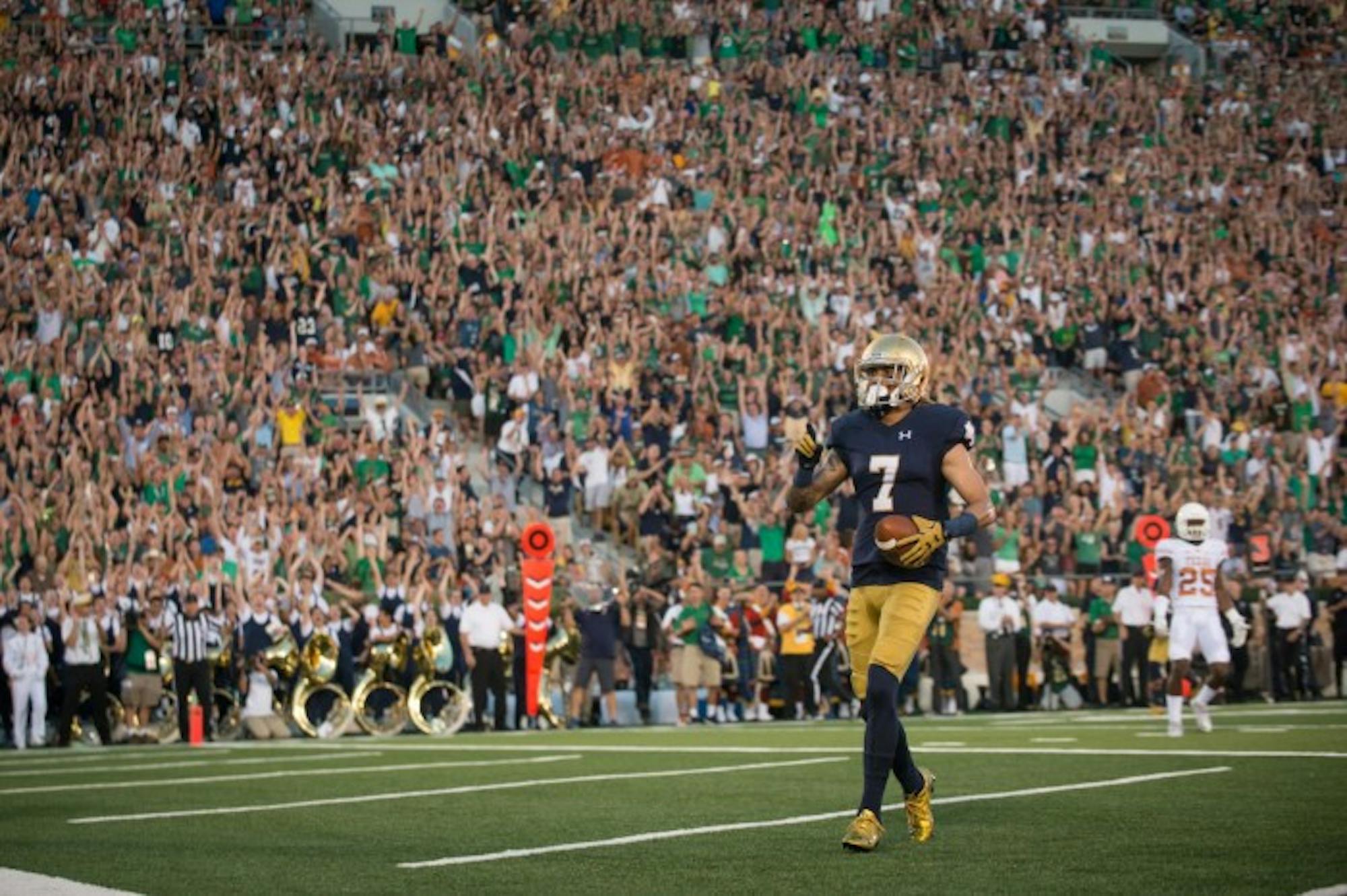 Former Irish receiver Will Fuller gets ready to celebrate after a touchdown pass during Notre Dame's 38-3 victory over Texas on Sept. 5 at Notre Dame Stadium.