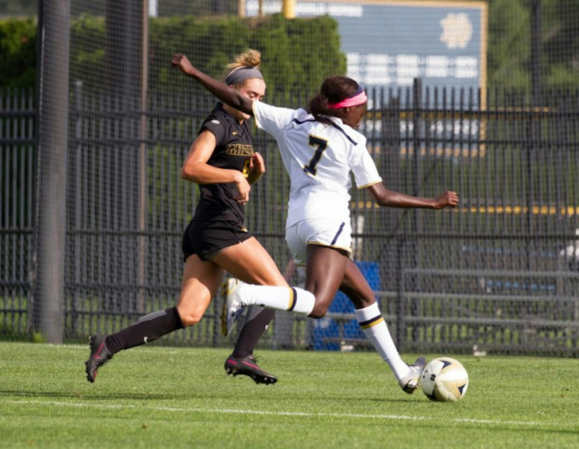 Junior forward Karin Muya dribbles around a defender in Notre Dame's 1-0 victory over Mizzouri on Sept. 4.