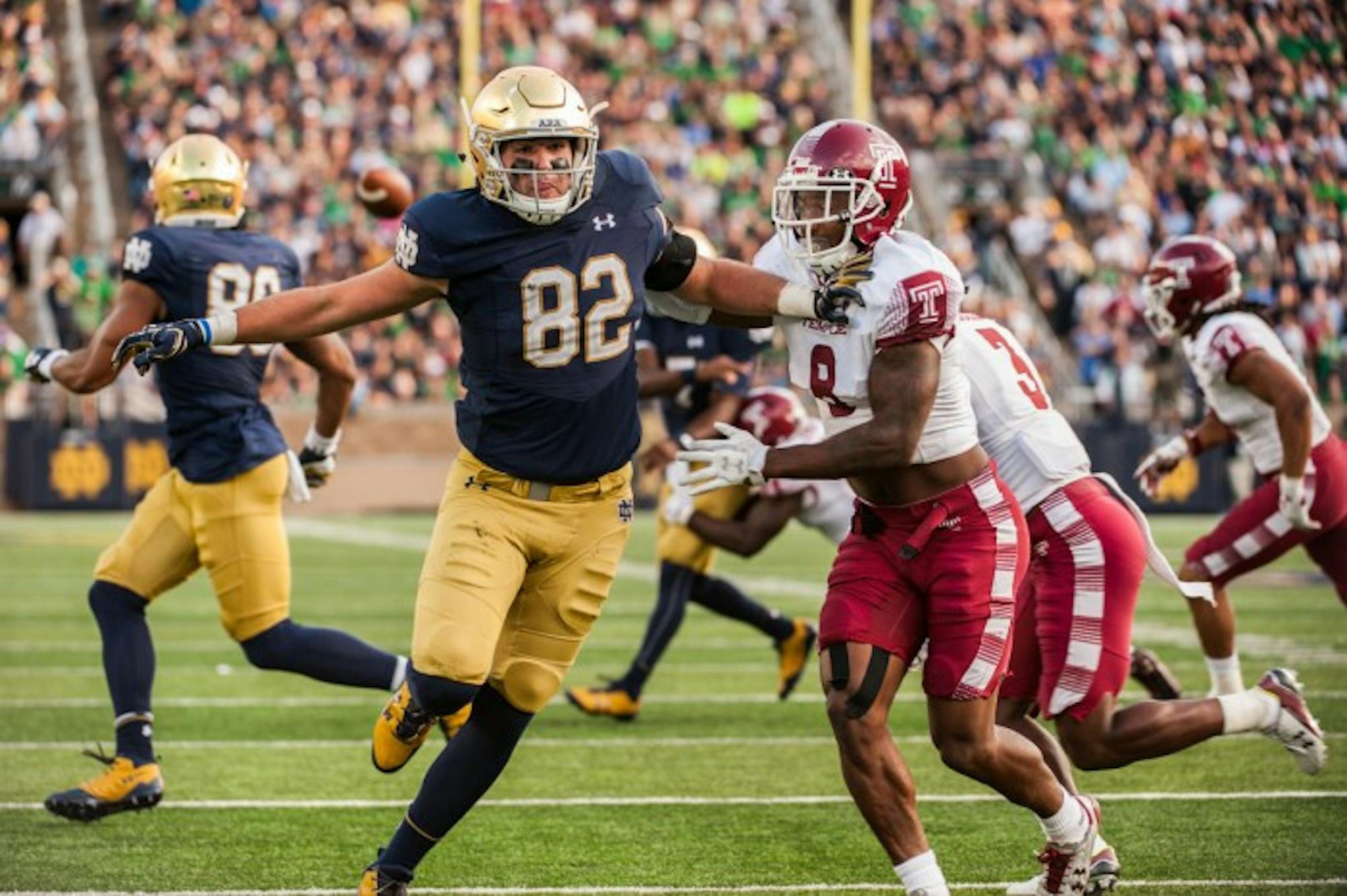 Irish senior tight end Nic Weishar looks to create separation as he runs a route during Notre Dame’s 49-16 win over Temple on Saturday at Notre Dame Stadium. Weishar caught his first career touchdown reception in the first quarter of the win for the Irish.