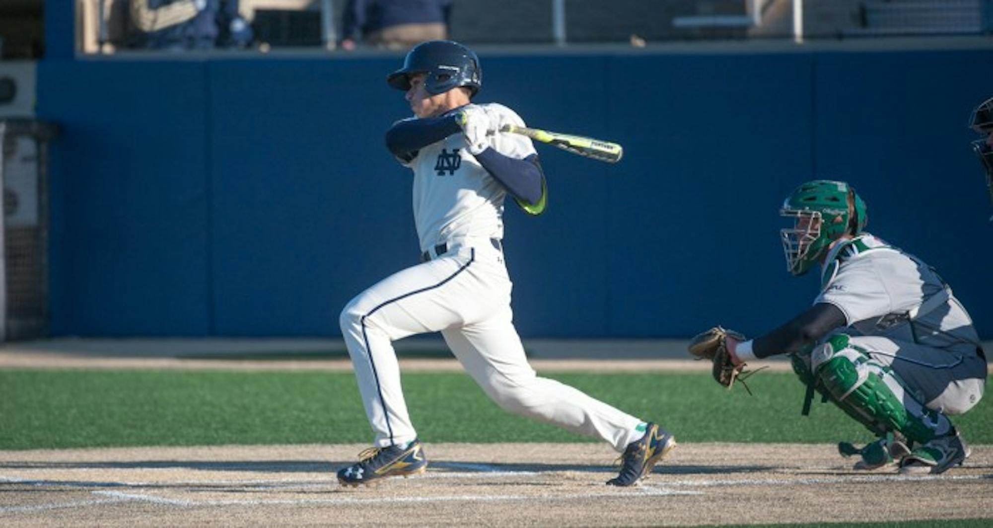 Irish senior catcher Ricky Sanchez finishes a swing during Notre Dame’s 4-1 win over Boston College at Frank Eck Stadium on April 15. Sanchez leads the squad with a .345 batting average this season.