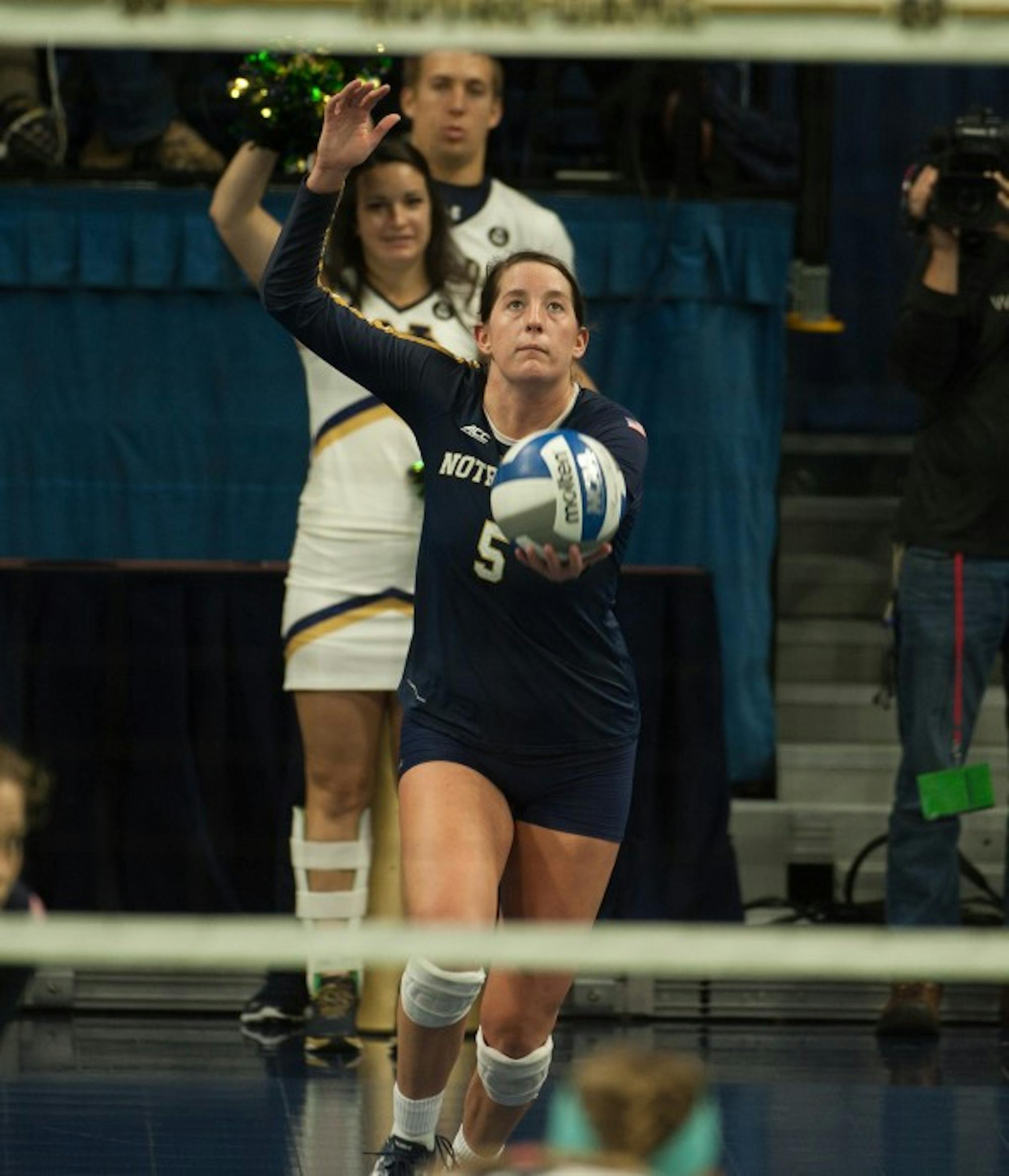 Sophomore outside hitter Sydney Kuhn prepares to serve during a 3-0 loss to Pittsburgh at Purcell Pavilion on Sunday.