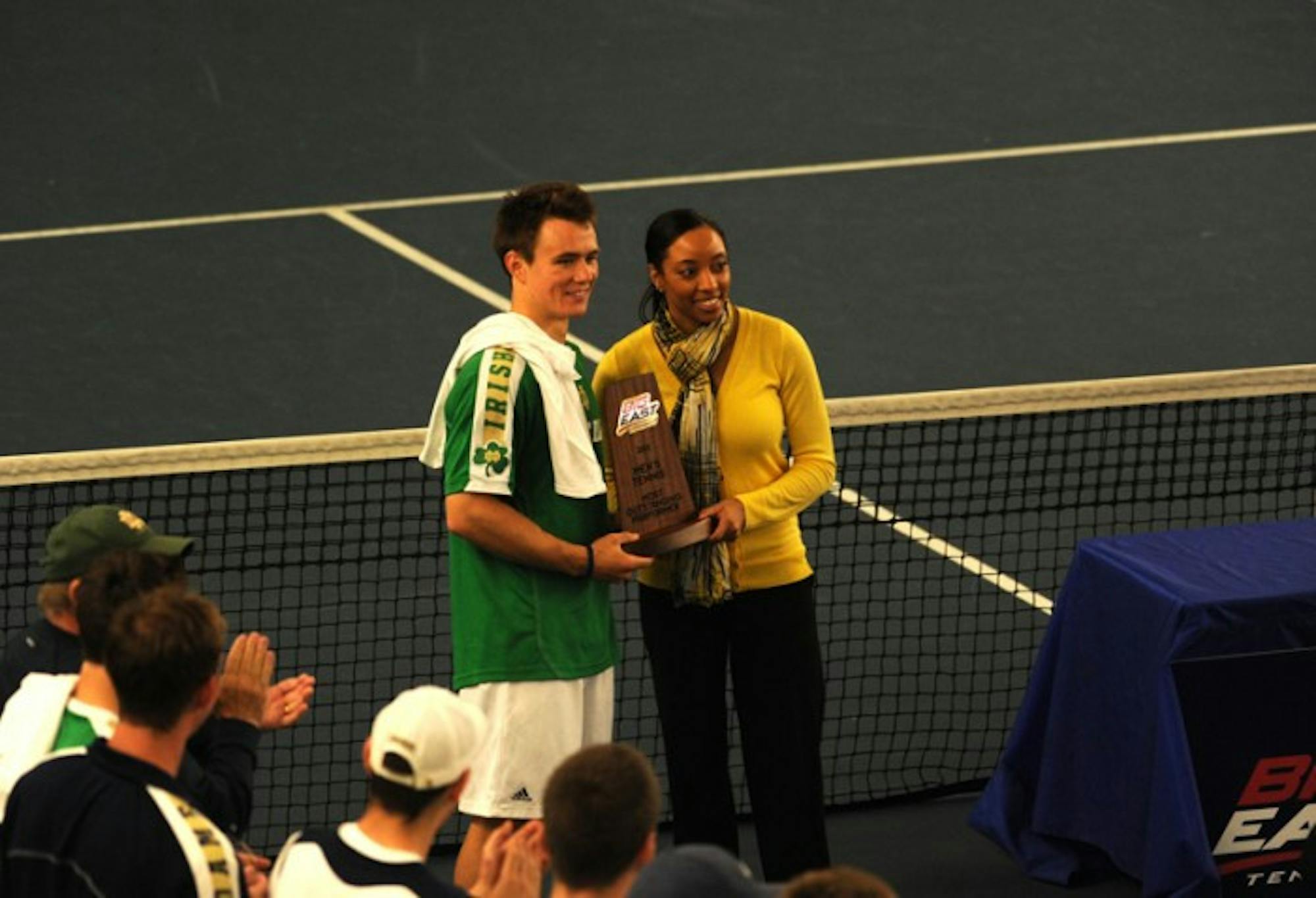 Irish senior Greg Andrews accepts the award for Most Outstanding Preformer at the Big East conference championship on Apr. 21, 2013. Andrews lost in both singles and doubles on Wednesday at Illinois.
