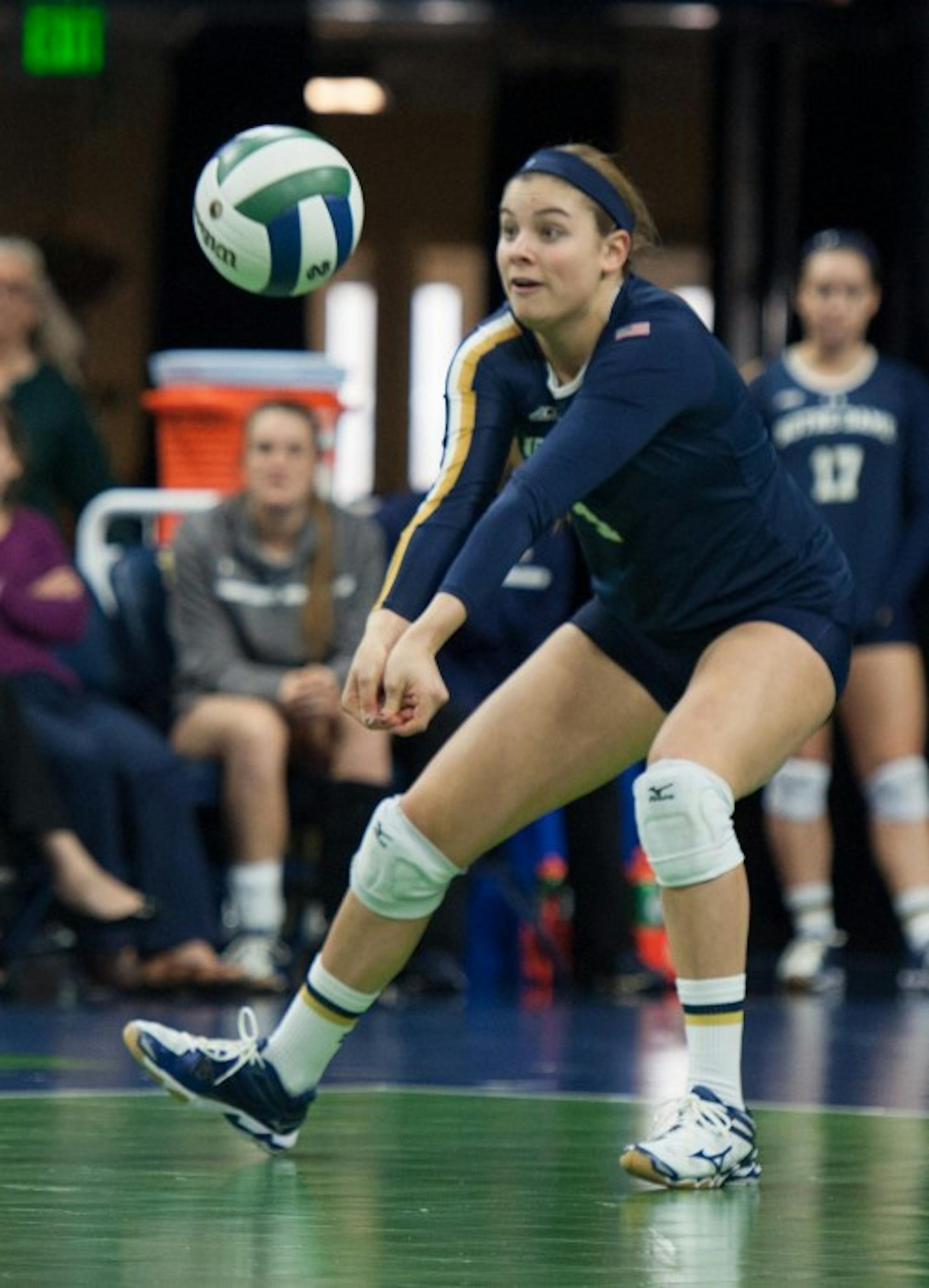 Freshman libero Jo Kremer digs a shot during Notre Dame’s 3-2 win over Louisville on Nov. 9 at Purcell Pavilion. The Irish rallied from two sets down to beat the Cardinals.