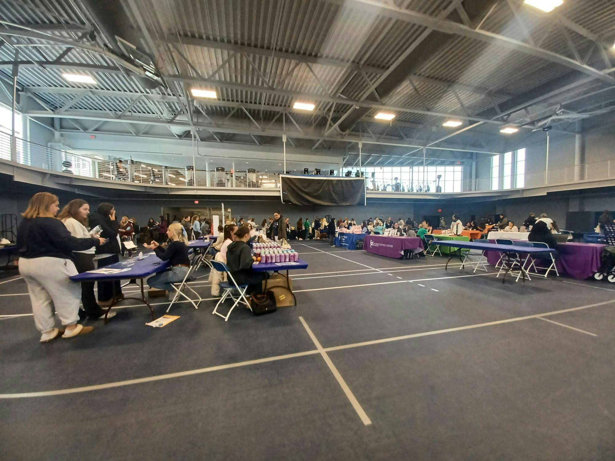 Students gather around tables for the 2025 Student Health Fair.jpg