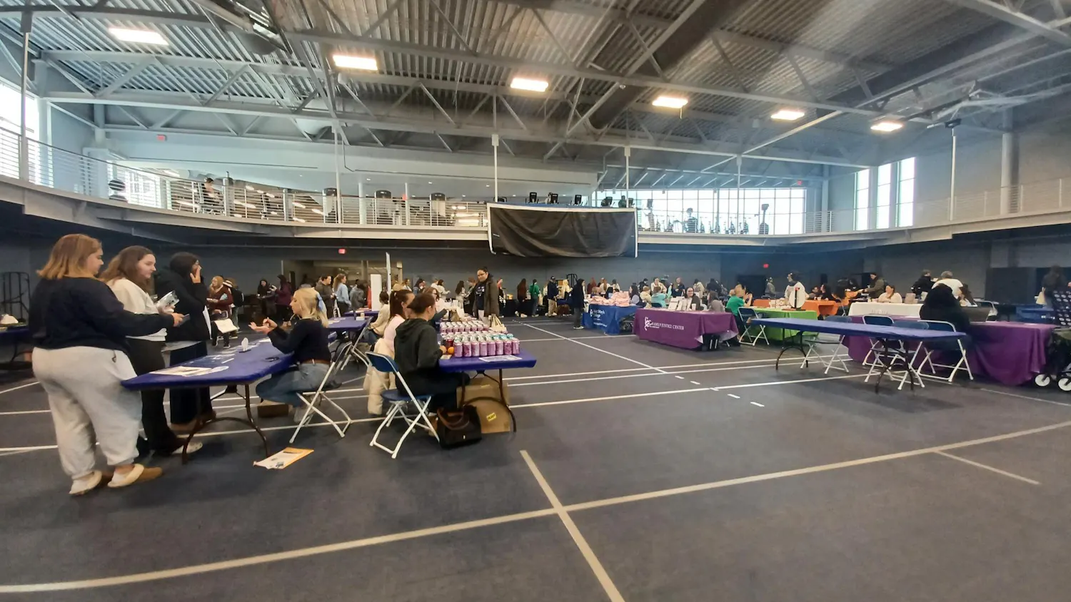 Students gather around tables for the 2025 Student Health Fair.jpg