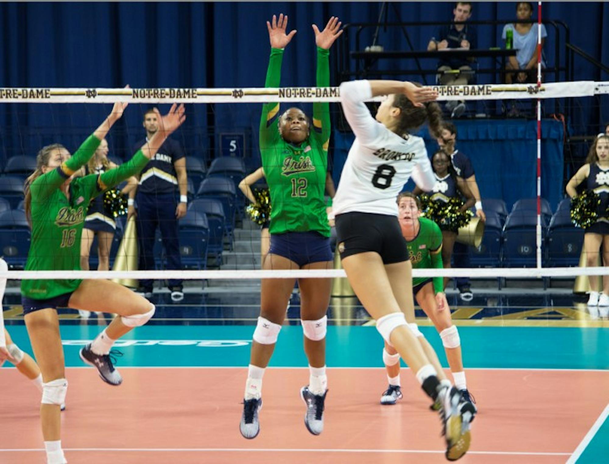 Irish freshman outside hitter Jemma Yeadon jumps for a block during the Golden Dome Invitational on Saturday at Purcell Pavilion.
