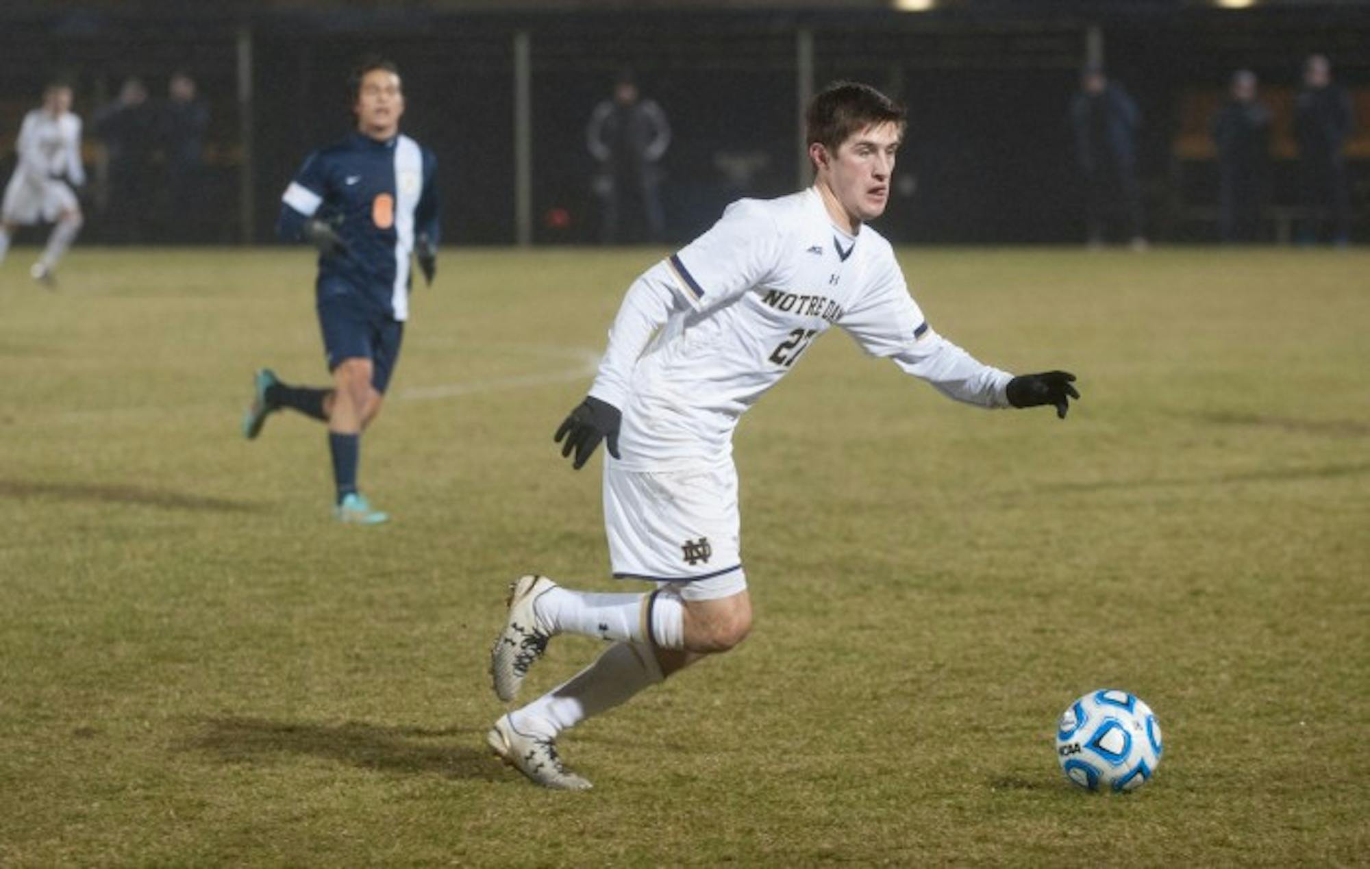 Senior midfieler Patrick Hodan dribbles the ball in the Notre Dame’s 1-0 loss to Virginia in the NCAA Championships on Nov. 30.