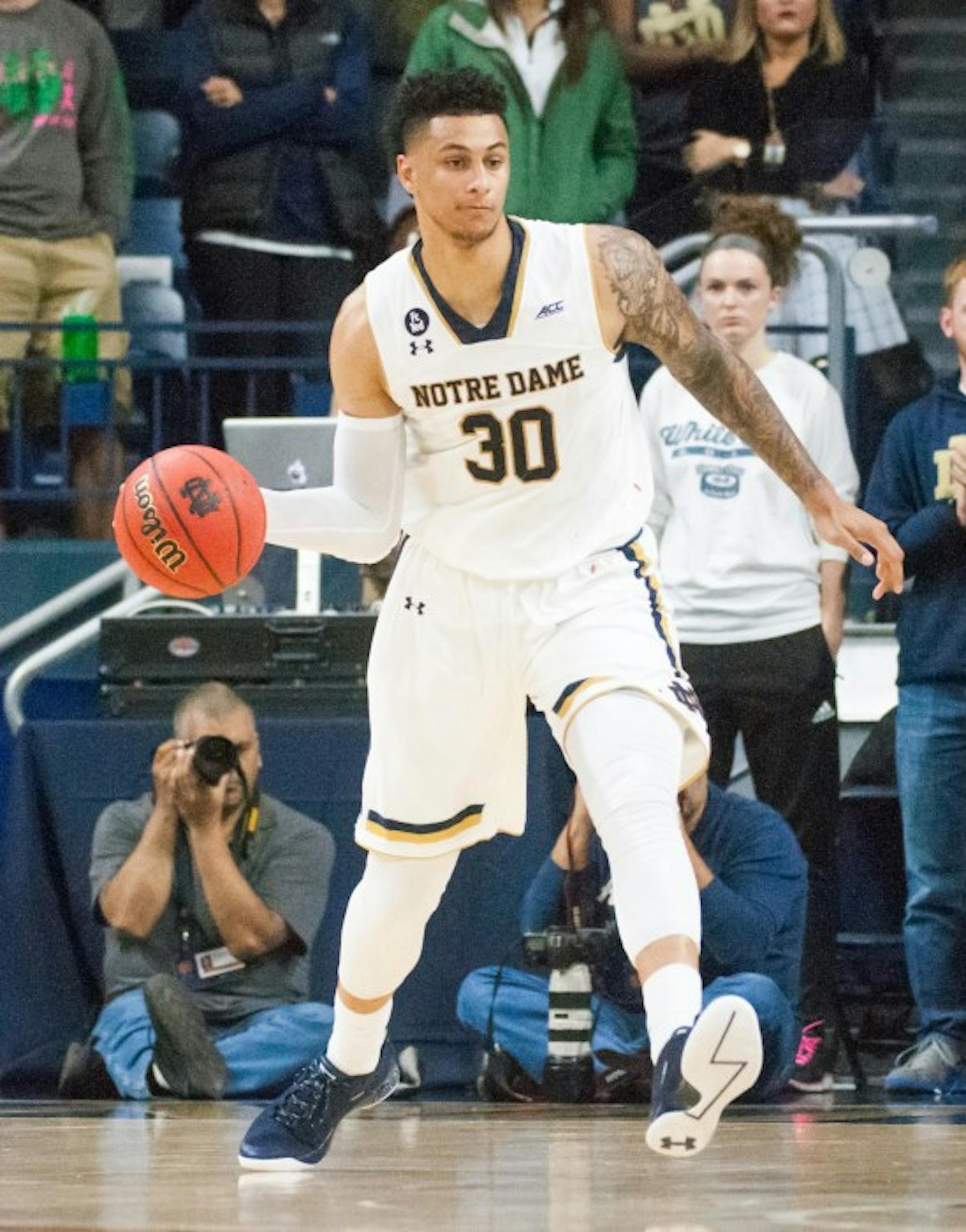 Senior forward Zach Auguste looks to pass during Notre Dame’s 86-78 victory over Milwaukee on Tuesday night at Purcell Pavilion.