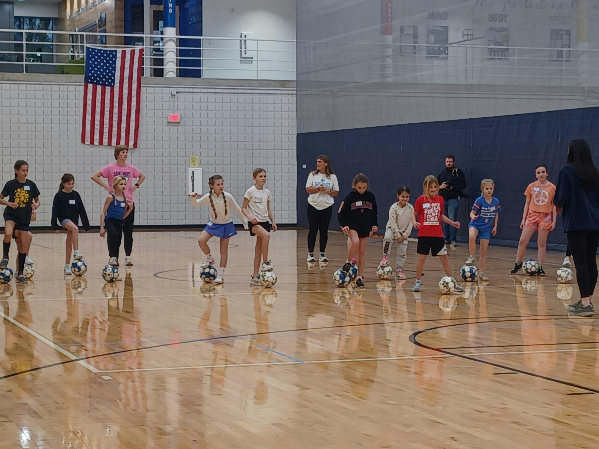 Youth Participates in Sports Day Clinic With Soccer Drills.jpg