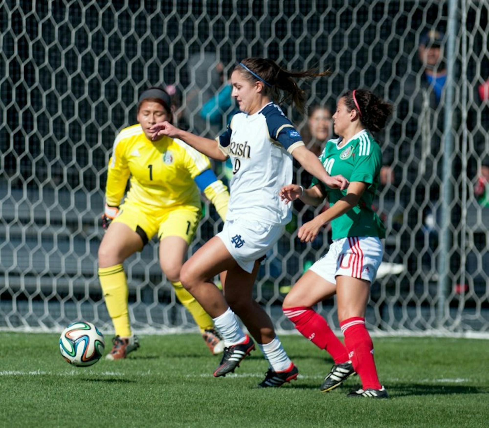 Notre Dame senior forward Lauren Bohaboy battles for possession with a U-20 Mexican National Team defender in front of the net on April 25. The Irish would defeat El Tri by a score of 2-0.