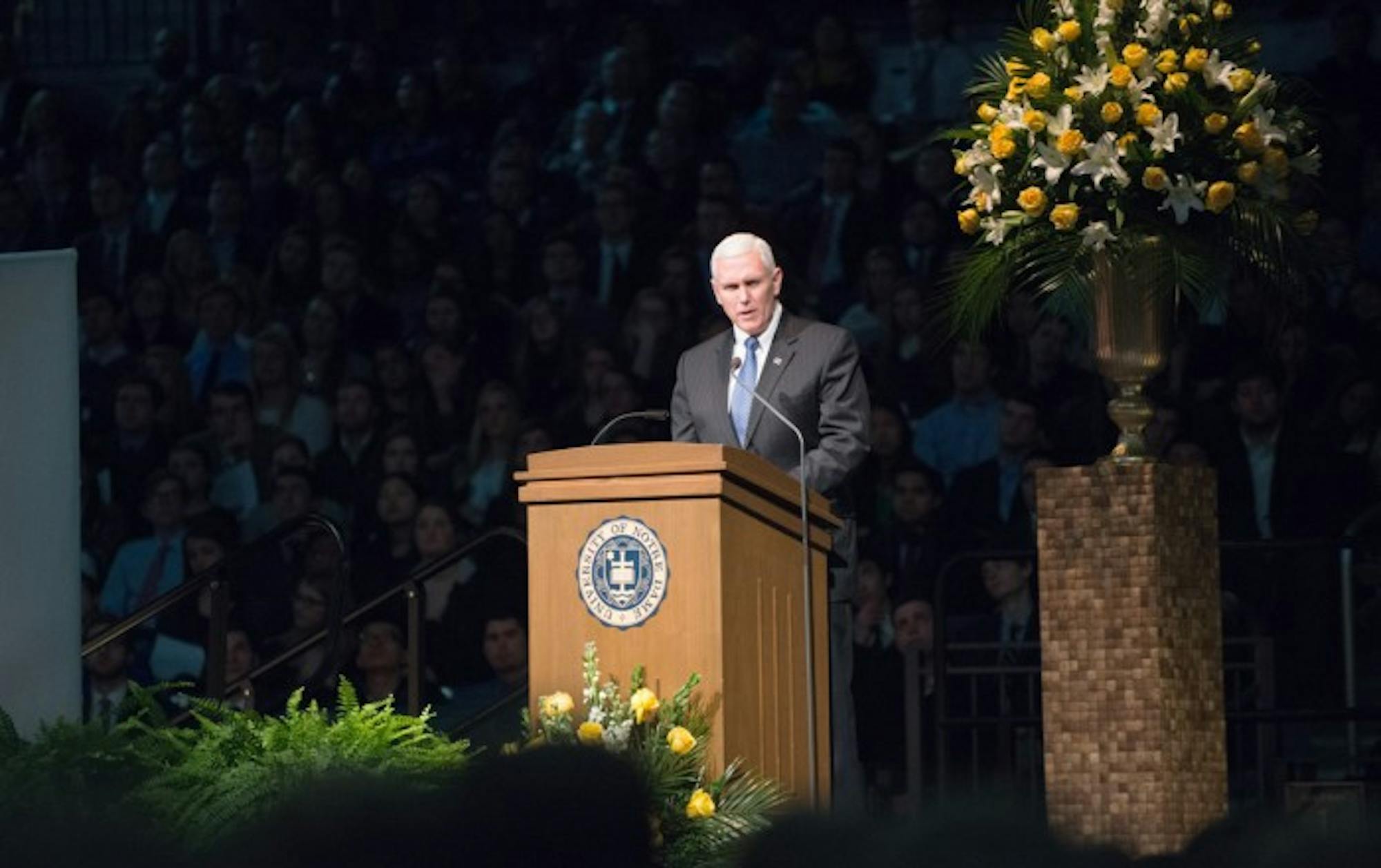 Mike Pence speaks in Purcell Pavilion at a 2015 memorial service for Fr. Theodore Hesburgh, who served as the University's 15th president. Pence will address students at this year's May 21st commencement.