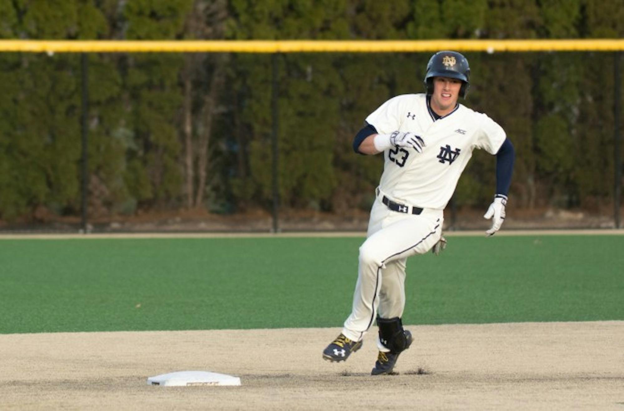 Junior second baseman Cavan Biggio rounds second base during Notre Dame’s 9-5 victory over UIC on March 22 at Frank Eck Stadium.