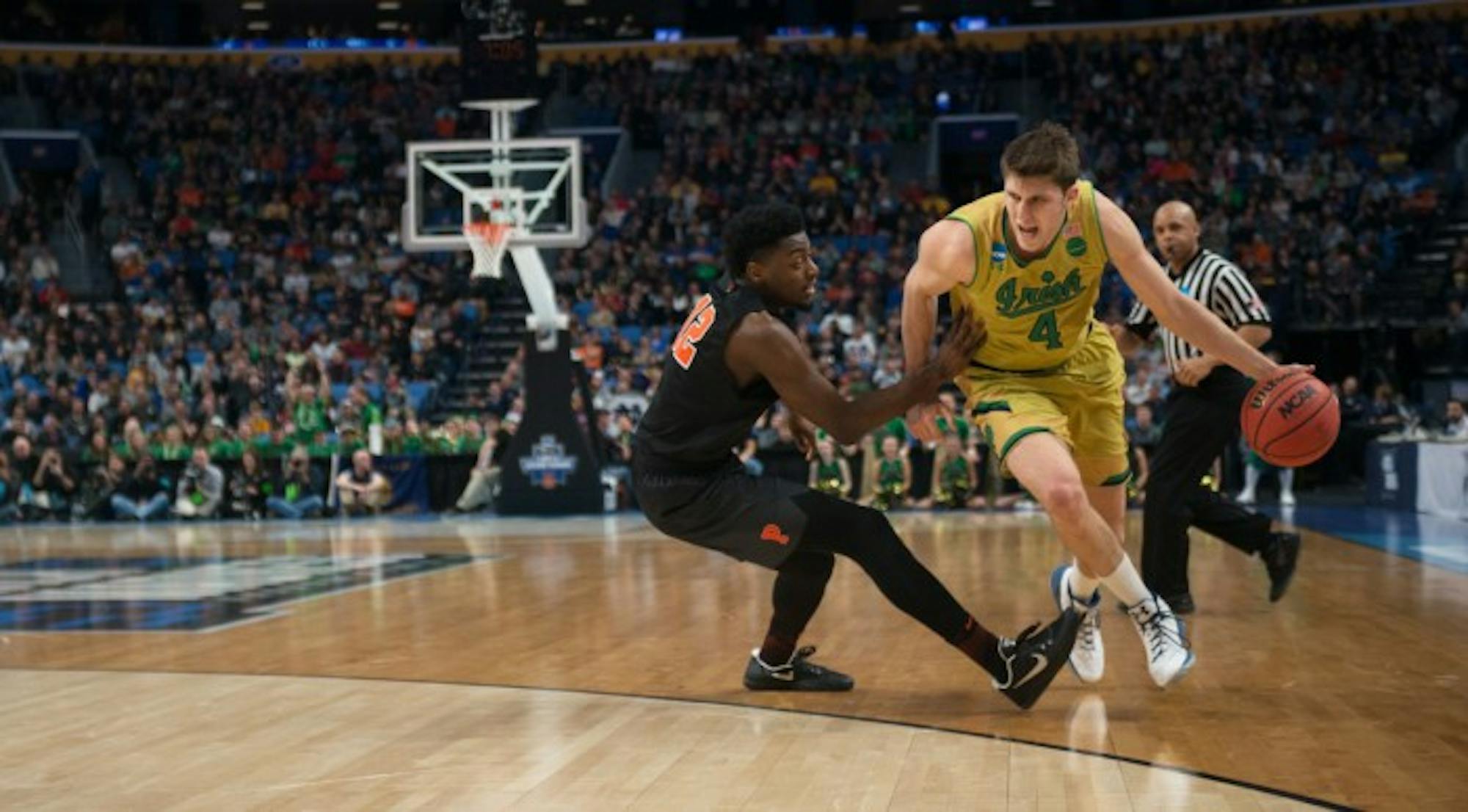 Irish sophomore forward Matt Ryan drives toward the basket  during Notre Dame’s 60-58 win over Princeton on March 16.