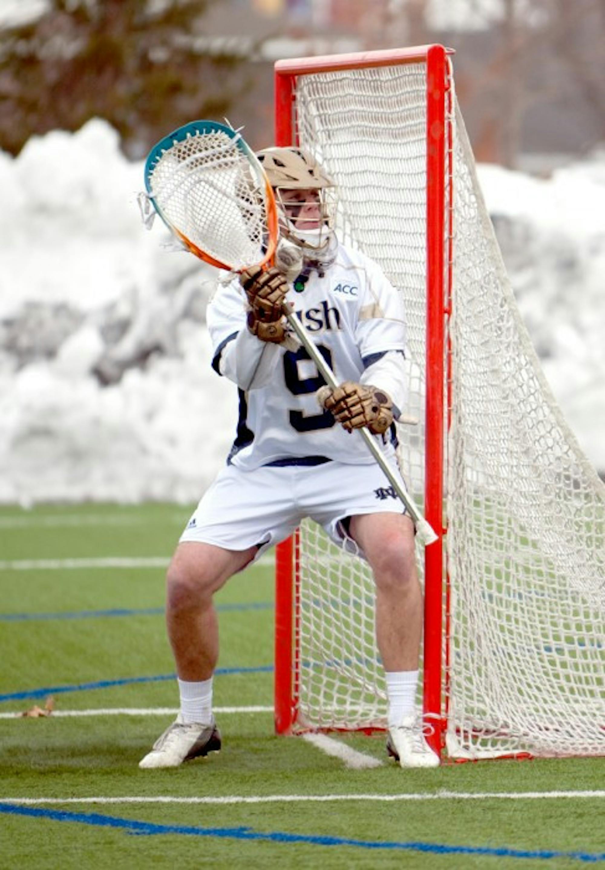 Junior goalkeeper Conor Kelly defends the goal during Notre Dame’s 8-7 loss to Penn State on Feb. 22 at Arlotta Stadium.