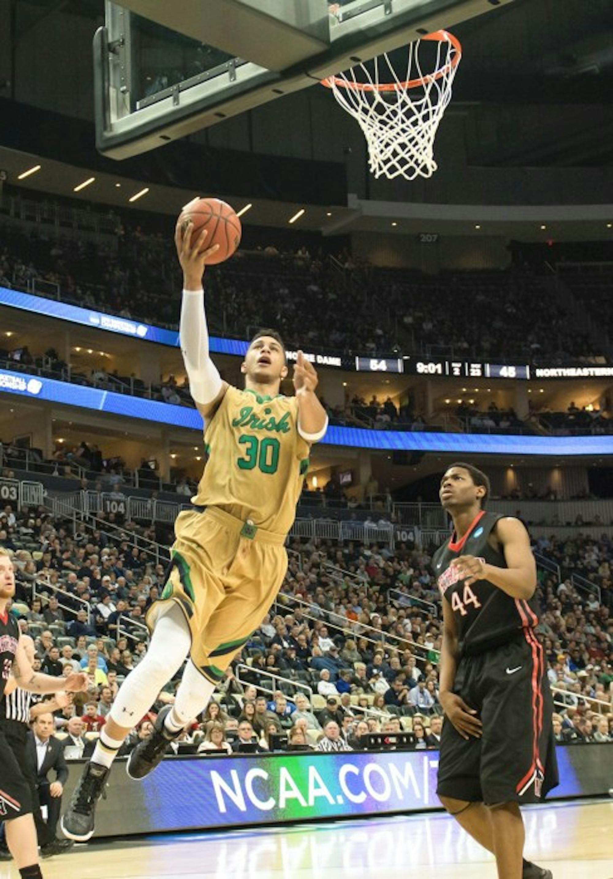 Irish junior forward Zach Auguste takes a shot during Notre Dame's 69-65 victory over Northeastern on March 19 at CONSOL Energy Center in PIttsburgh.