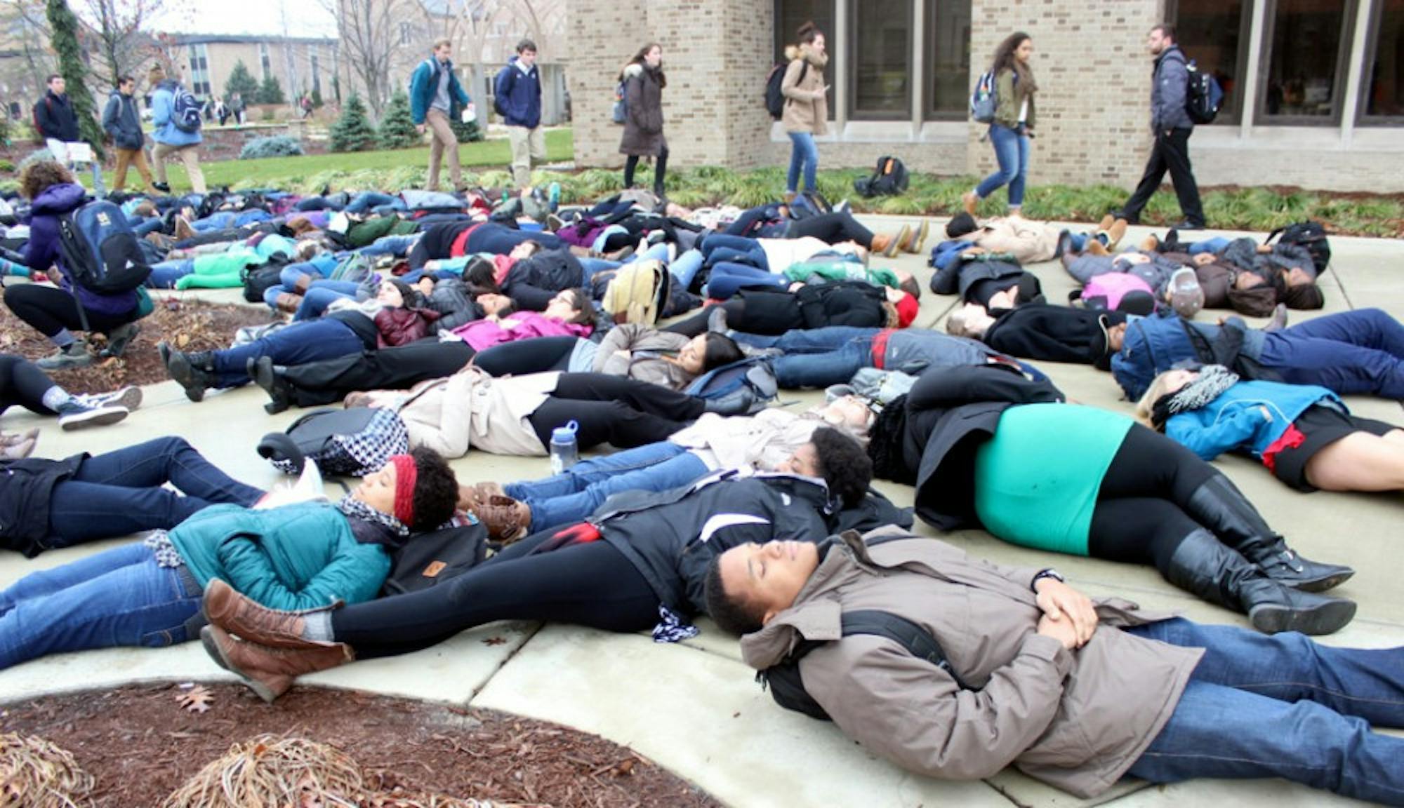 Students and members of the Notre Dame community cover the space in between O’Shaughnessy and DeBartolo Halls in a “die-in” Tuesday, part of a demonstration against police brutality and racial injustice.