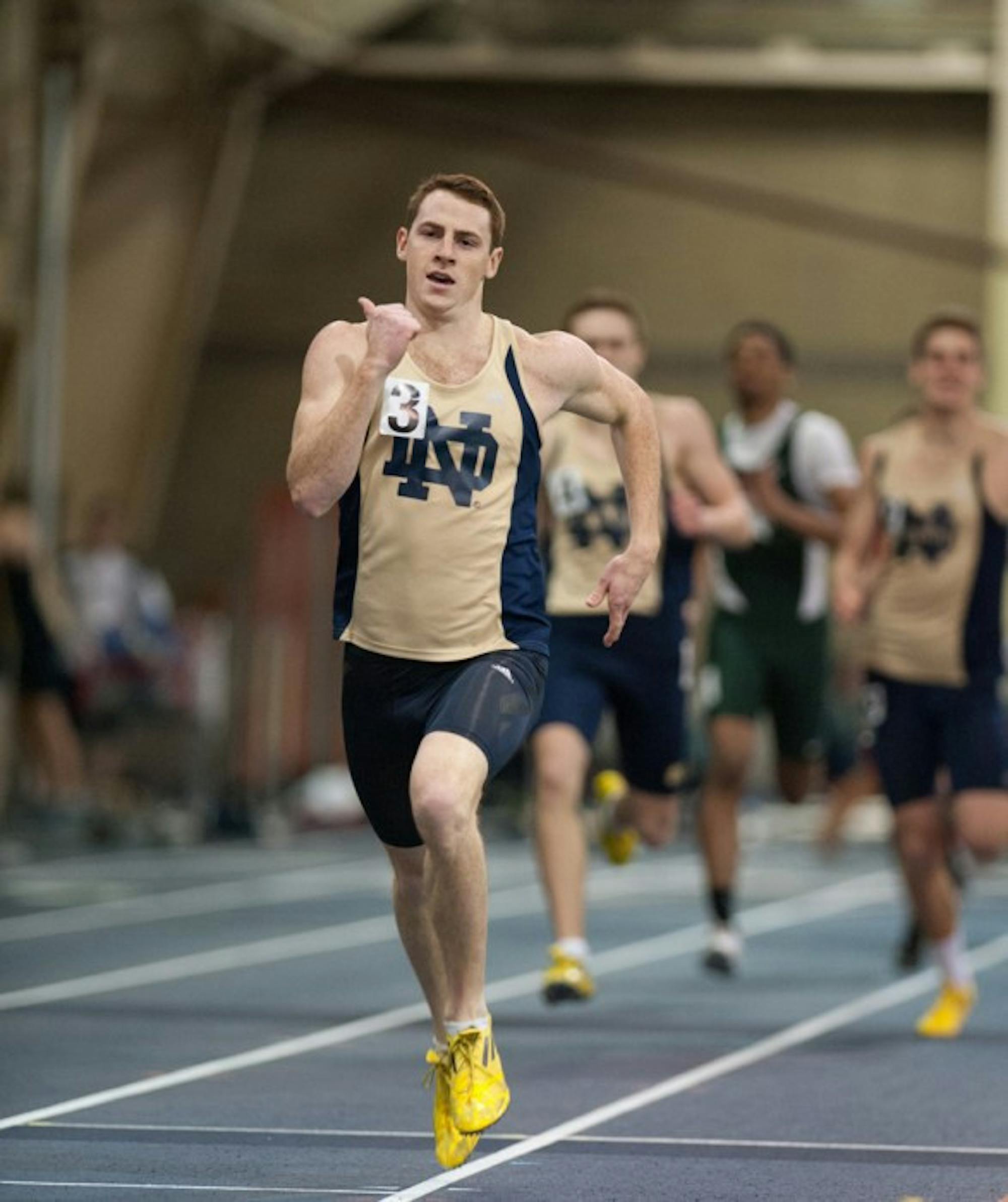 Senior Patrick Feeney races in the 400-meter dash at the Notre Dame Invitational on Jan. 25. Feeney competed in two third-place relays Saturday at the Alex Wilson Invitational.