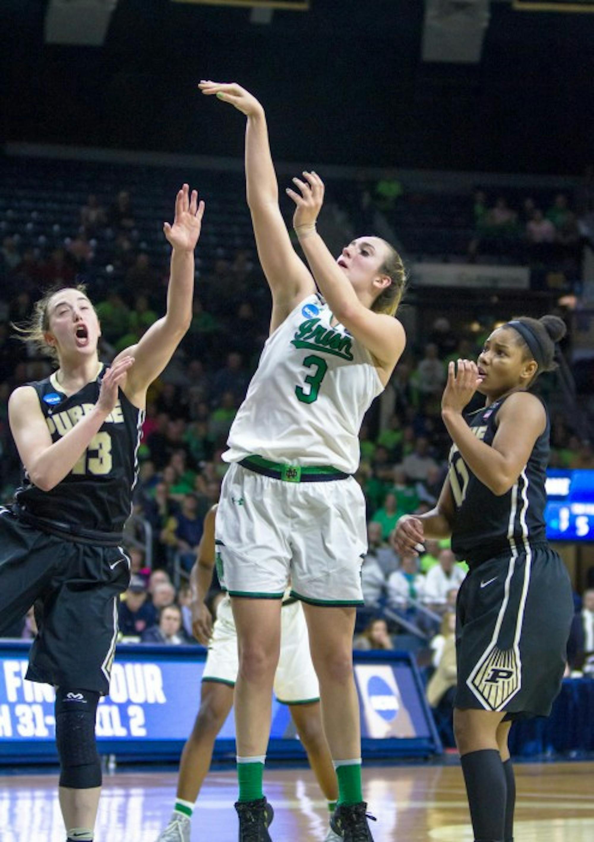 Irish sophomore guard Marina Mabrey shoots a jumper during Notre Dame’s 88-82 win over Purdue on Sunday at Purcell Pavilion.