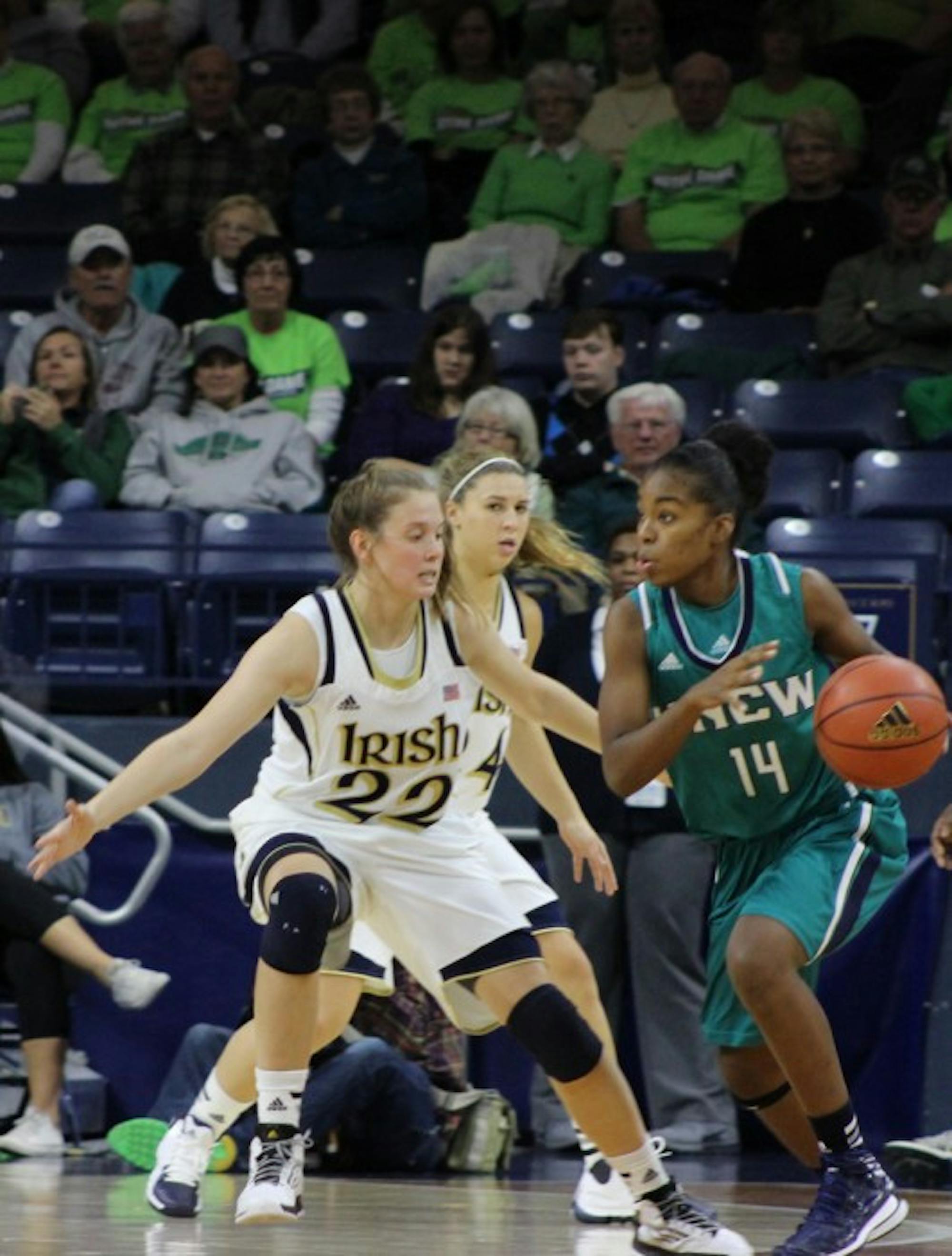 Irish junior guard Madison Cable defends the ballhandler during Notre Dame’s 99-50 victory over UNC Wilmington on Nov. 9, 2013.