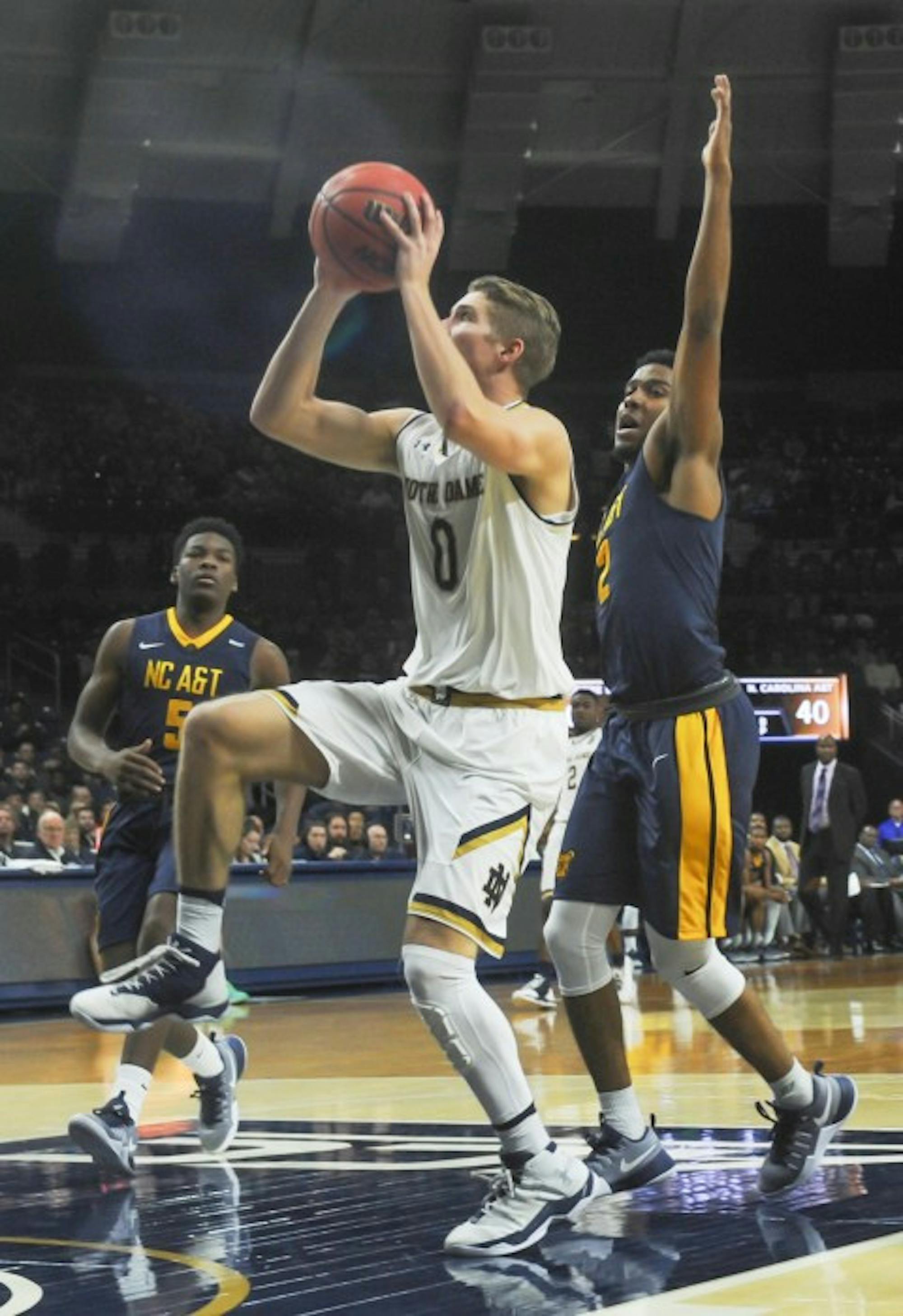 Irish sophomore guard Rex Pflueger goes up for a shot attempt during Notre Dame's 107-53 win over North Carolina A&T on Sunday.