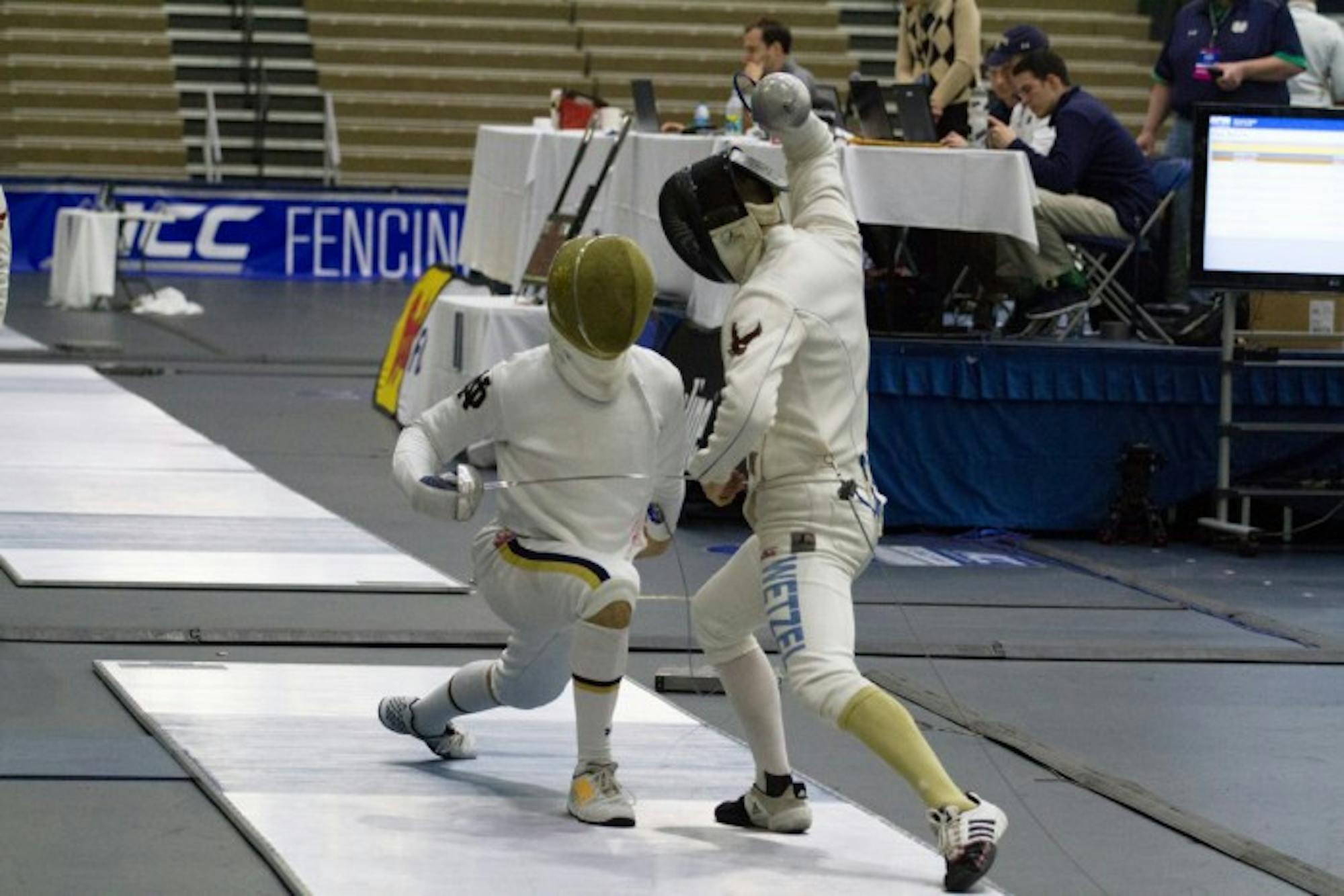 Irish sophomore Dylan French lunges at his opponent during the ACC championship on Feb. 28 at Castellan Family Fencing Center. The Irish men’s team defeat Boston College 23-4 and won the ACC title.