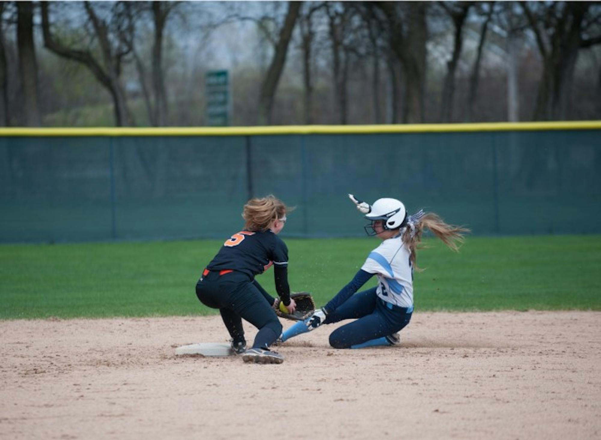 Belles freshman shortstop/second baseman Jamie Young slides into second base in Saint Mary’s 9-6 win over Kalamazoo yesterday.