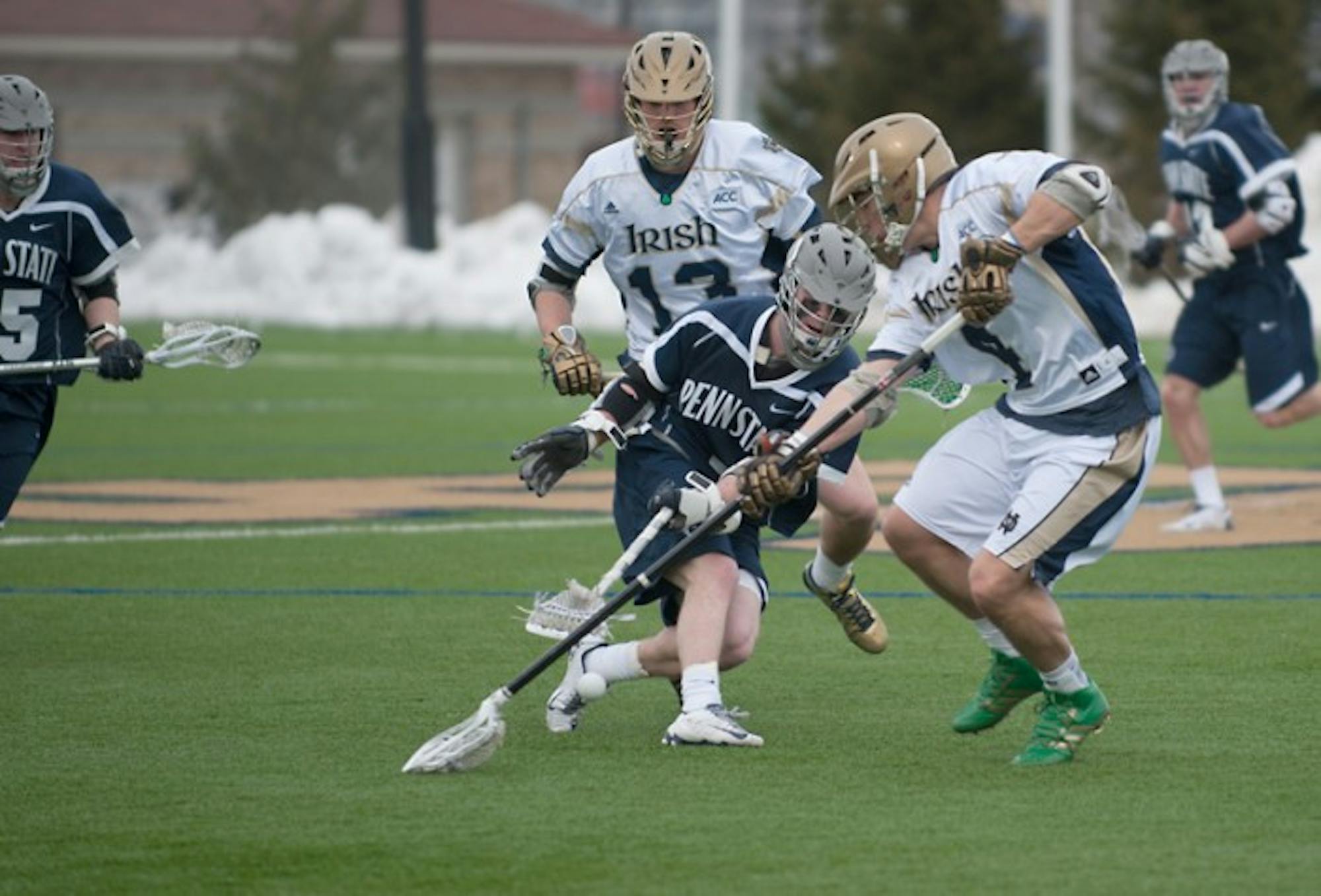 Irish senior captain and defenseman Stephen O’Hara battles for a ground ball during Notre Dame’s 8-7 loss to Penn State on Feb. 22.
