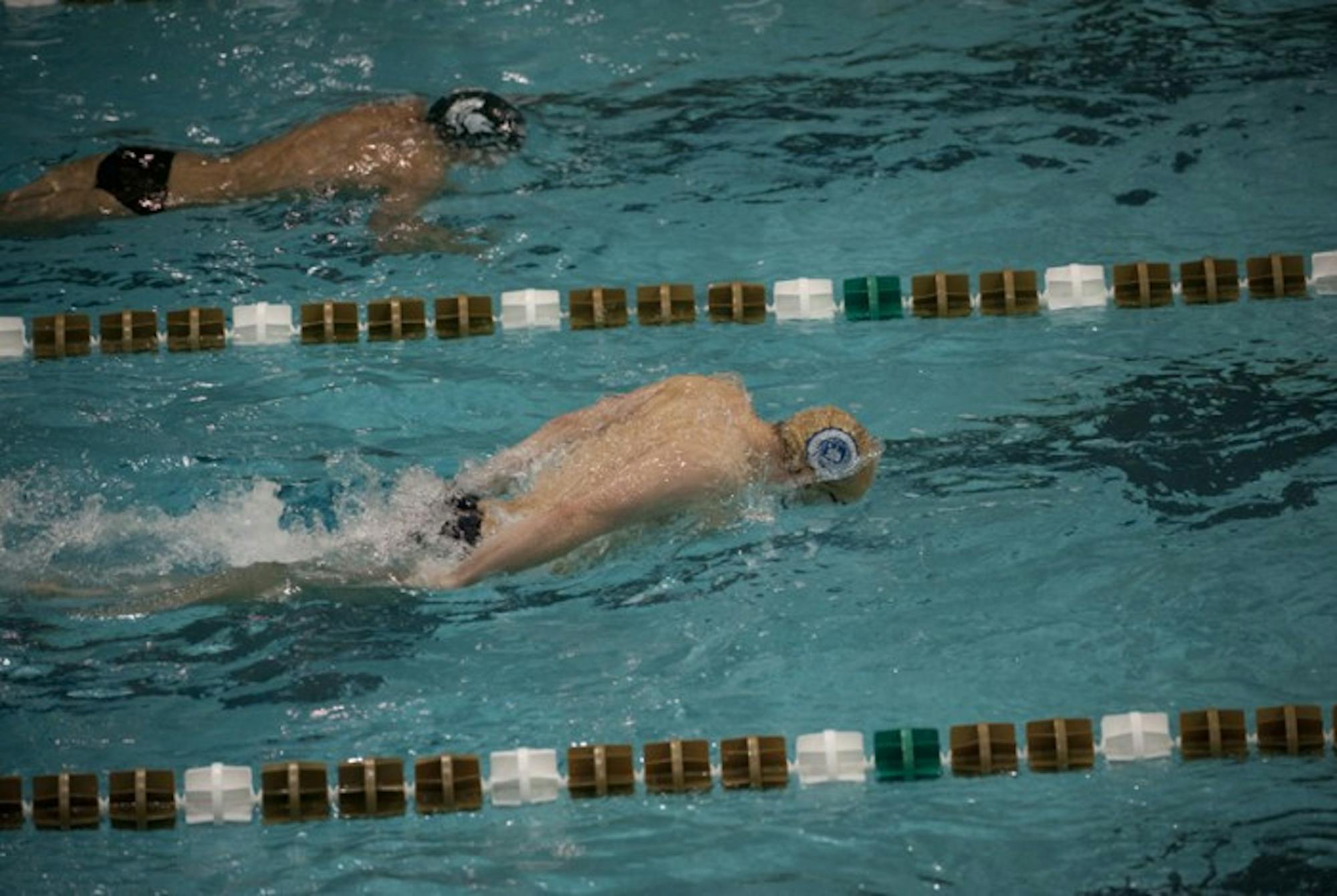 John Williamson swims in the 200-meter fly during a dual meet against Michigan State on Nov. 15.