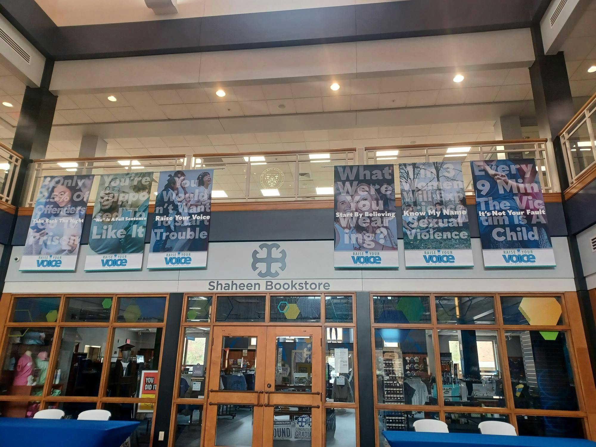 Six Raise Your Voice Symposium Flyers Hung on Sunday.jpg