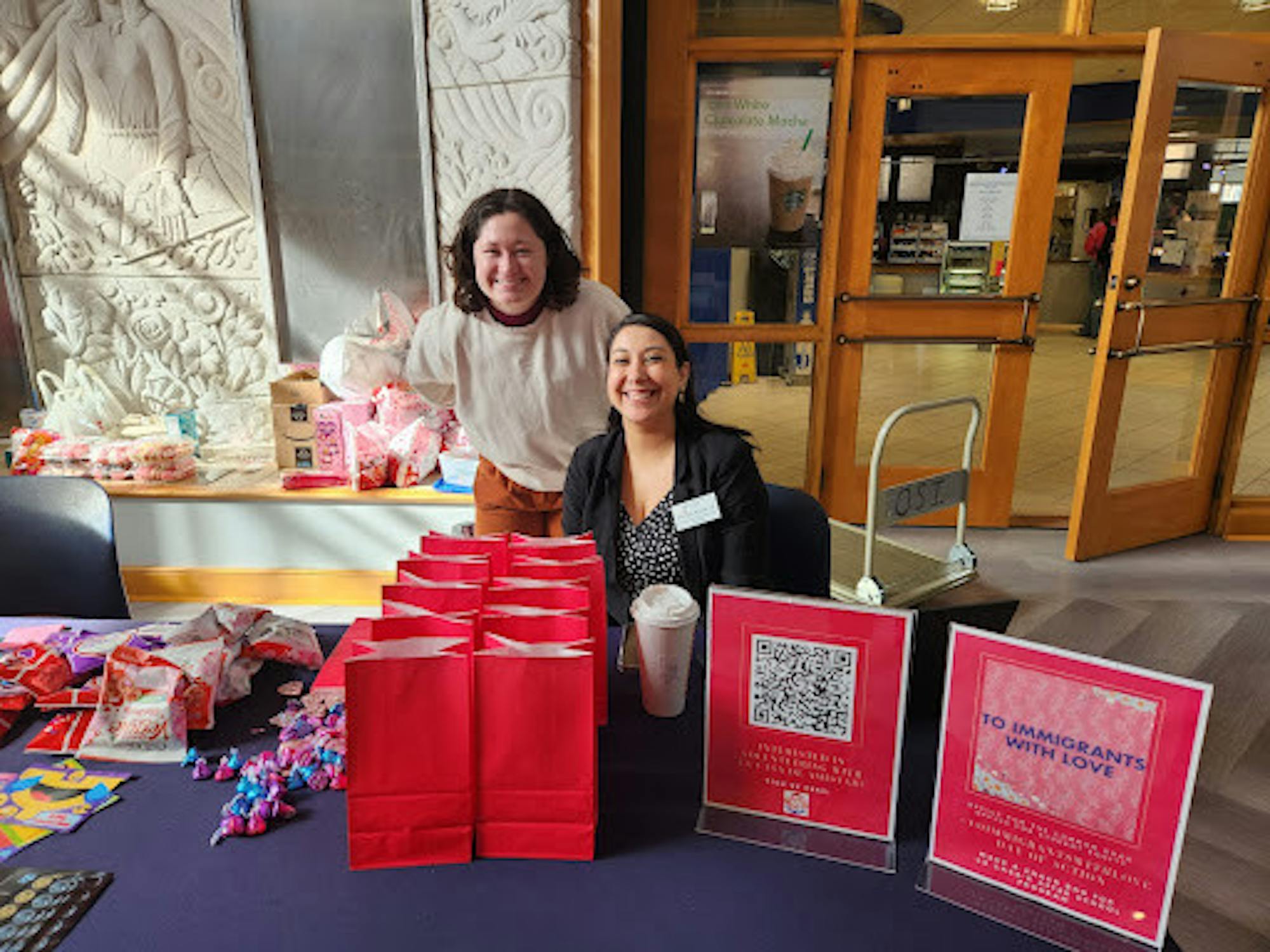 Maria Gonzalez-Diaz and Christin Kloski host an event asking students to stuff snack bags and write messages of encouragement for a local community center.