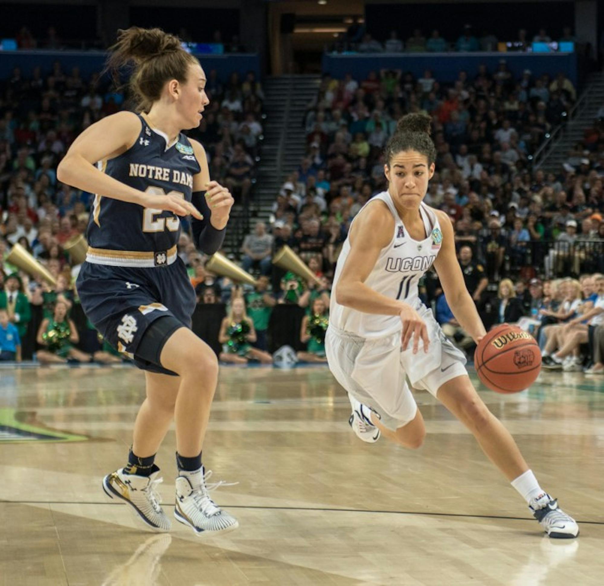 Senior guard Michela Mabrey attempts to defend an oncoming UConn player during Notre Dame’s 63-53 loss to UConn on April 7. Mabrey scored a total of 11 points in the loss on Saturday.