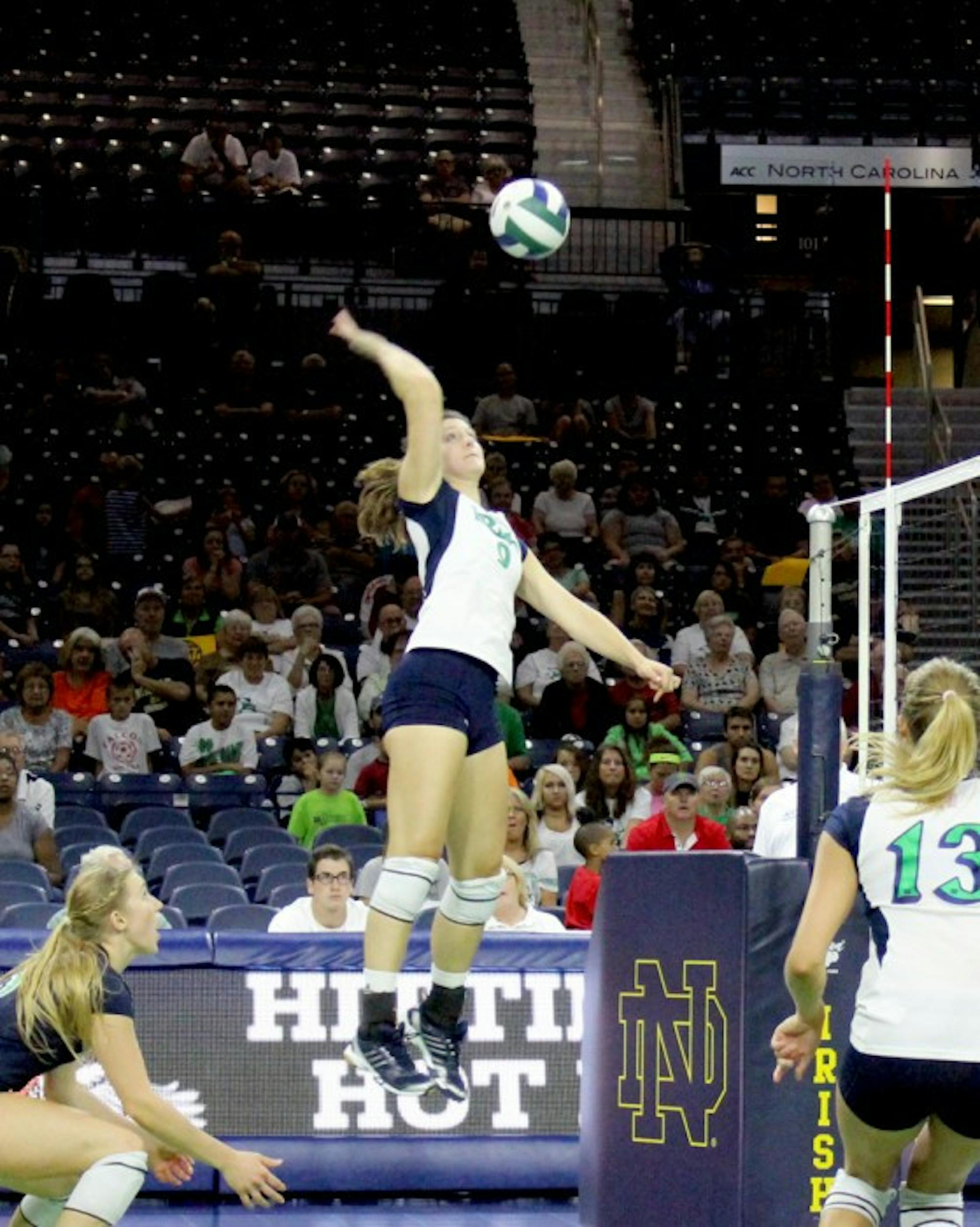 Irish graduate student outside hitter Nicole Smith goes up for a hit during an exhibition match against Polish club team Dabrowa on Sept. 8, 2013. Notre Dame lost, 3-0.