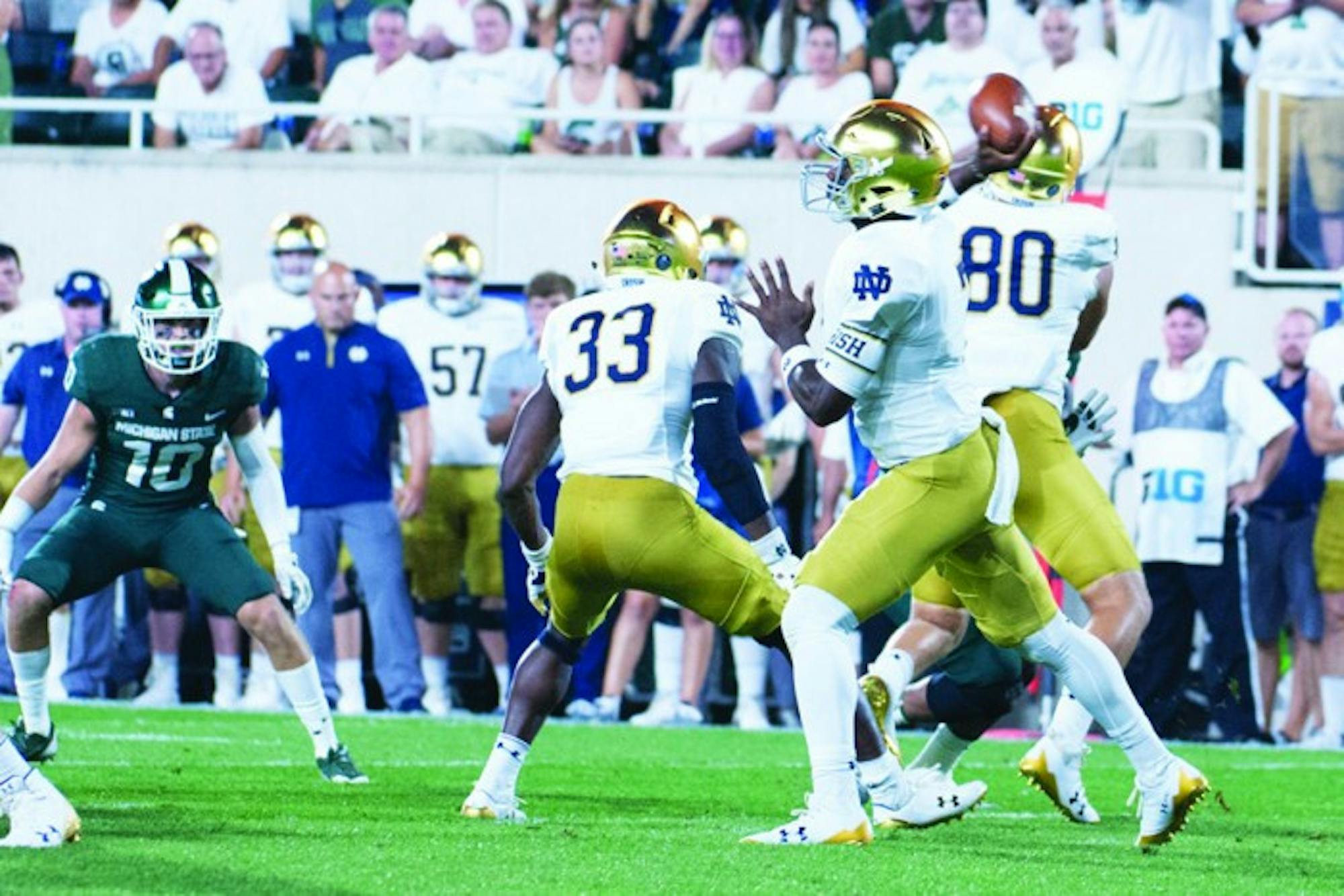Irish junior quarterback passes the ball during Notre Dame's 38-18 win over Michigan State on Saturday in East Lansing, Michigan.