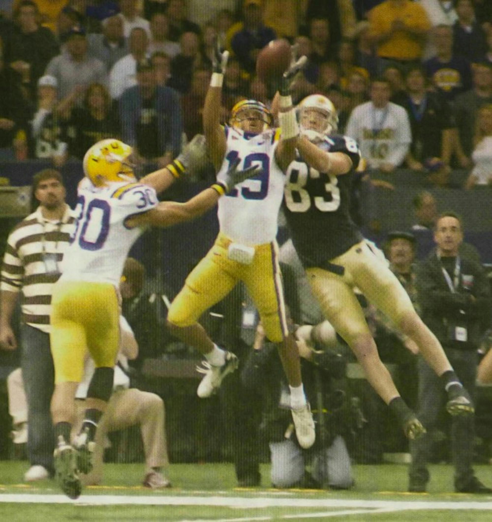 LSU defenders intercept former Irish quarterback Brady Quinn’s pass to wide receiver Jeff Samardzija  the 2007 Sugar Bowl.