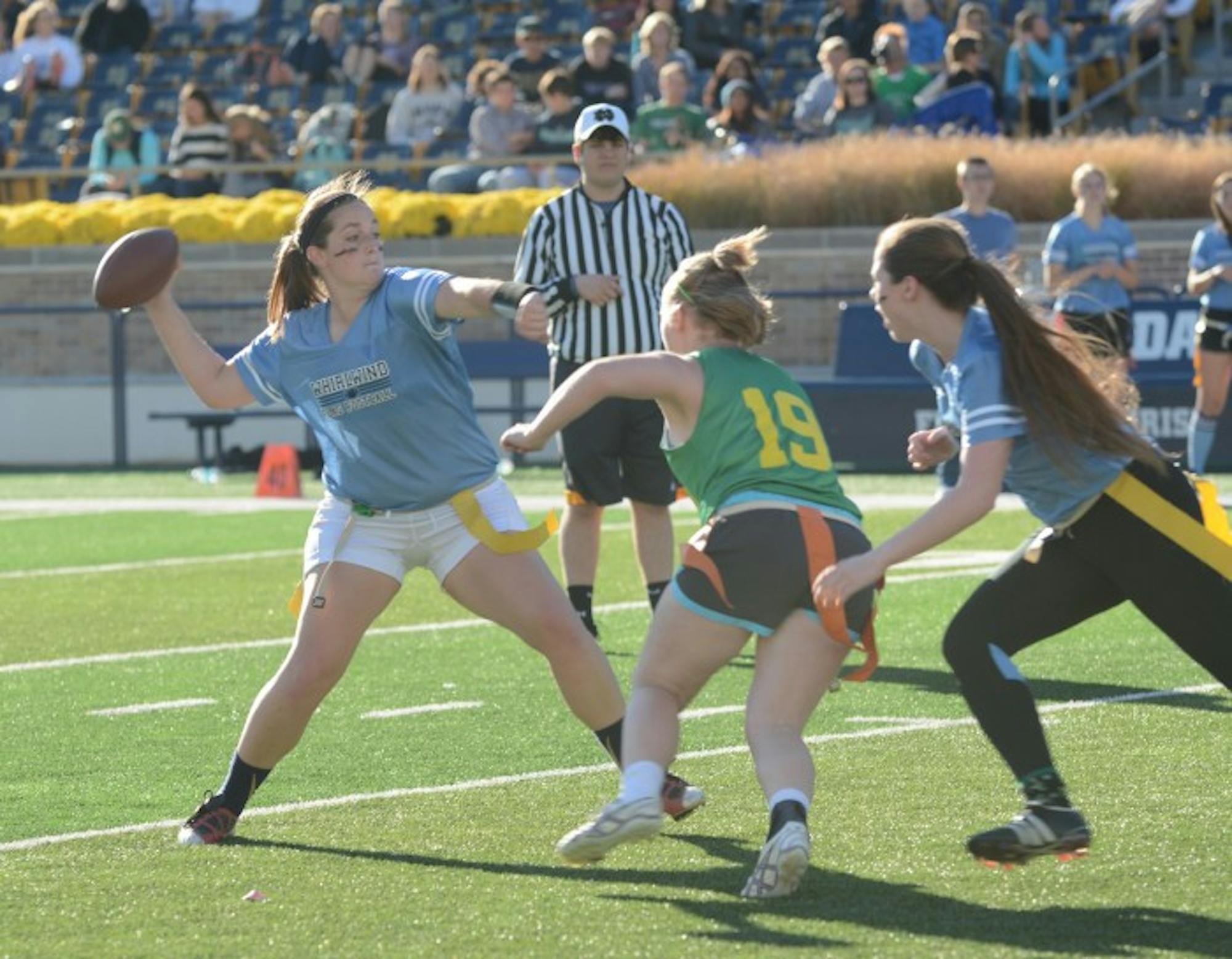 Whirlwind junior quarterback Rachel Wimsatt steps into a pass during Welsh Family’s 26-7 win over Howard on Sunday.