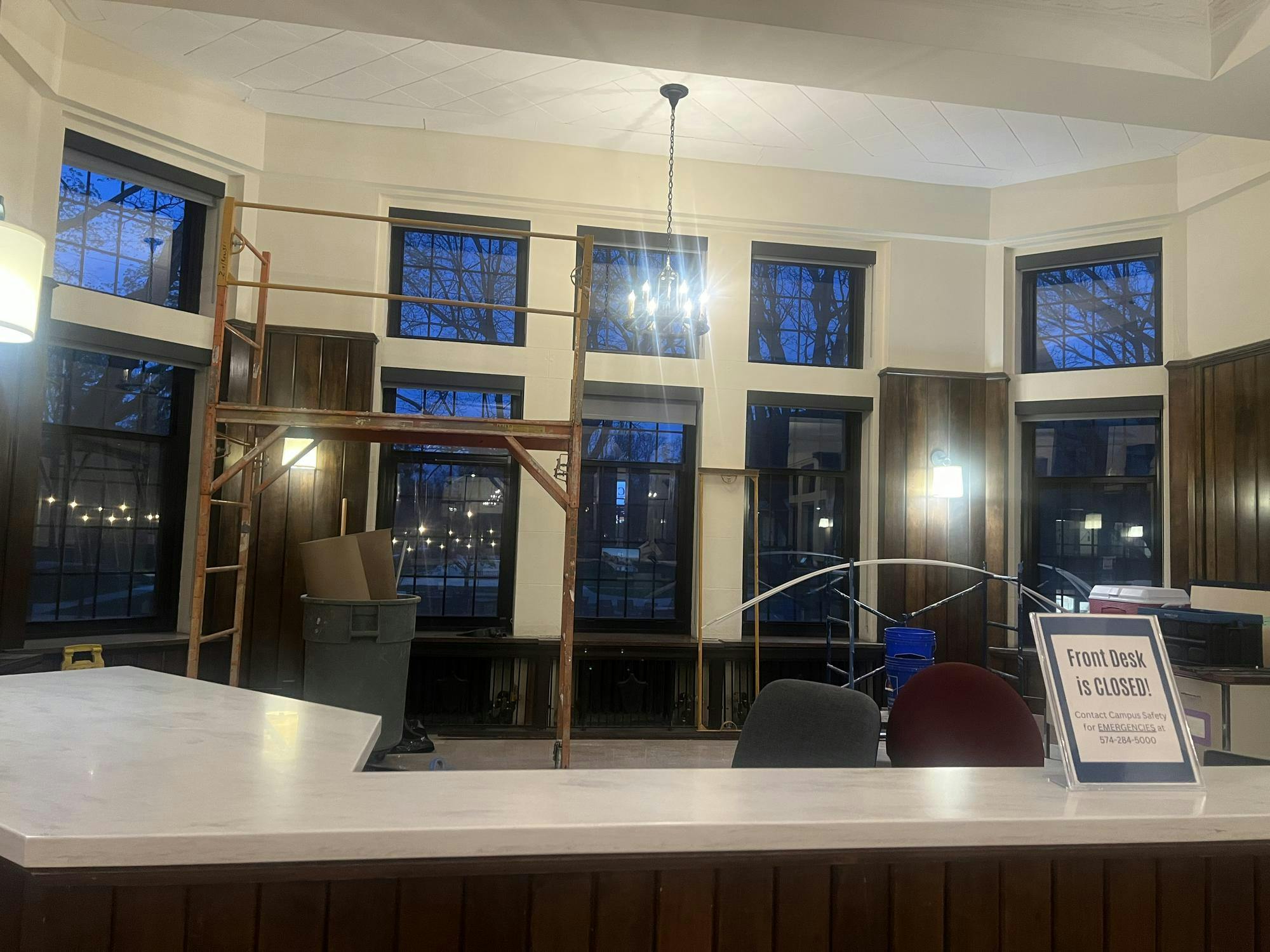 Interior renovations occur around the front desk of Le Mans Hall.jpeg