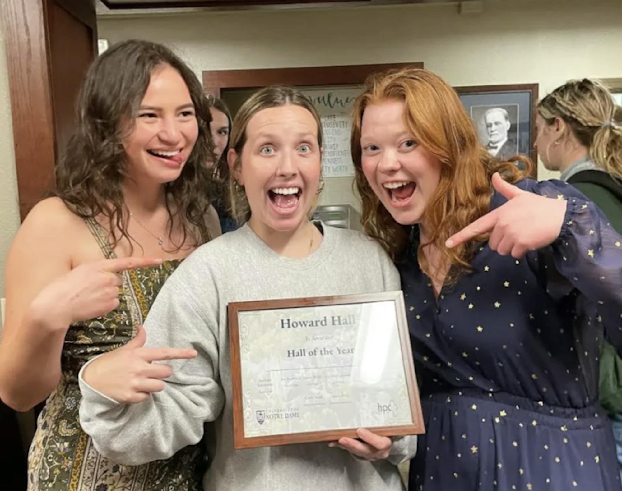 Howard Hall 2021-2022 vice presidents Cassie Van Etten (left) and Lauryn Pugh and president Clare Brown celebrate winning the 2021-2022 Hall of the Year contest.