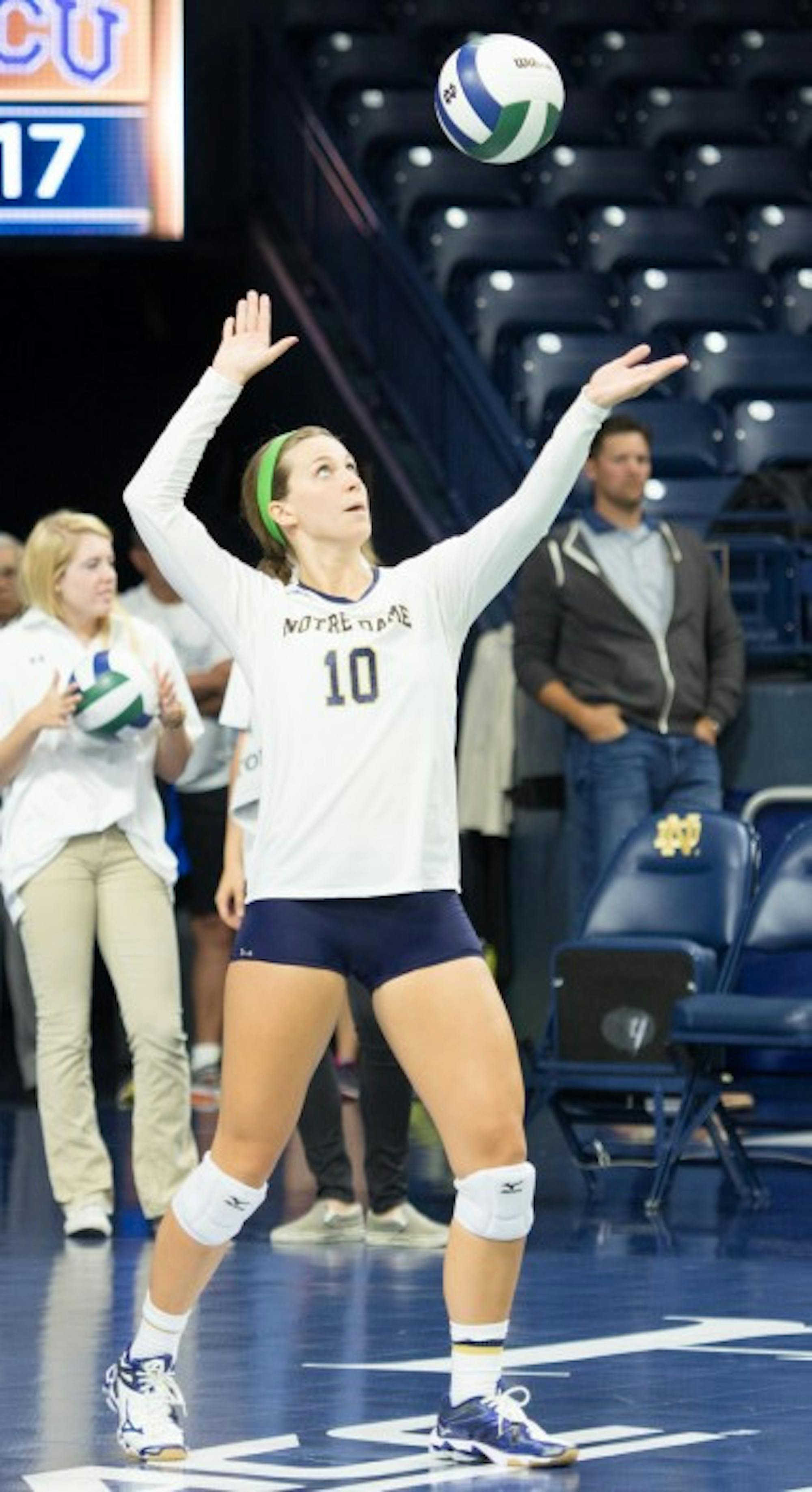 Irish senior libero Kathleen Severyn launches a serve during a 3-1 loss to TCU on Sept. 12 at Purcell       Pavilion. Severyn collected six digs and two assists over the weekend against Miami and Florida State.