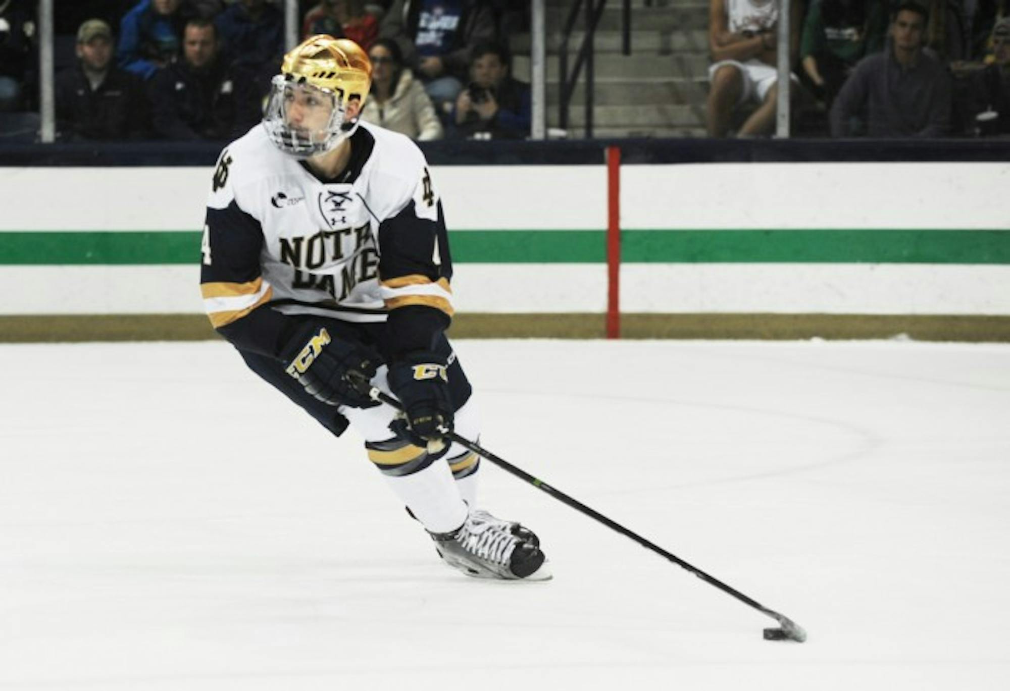 Sophomore defenseman Dennis Gilbert surveys the ice during Notre Dame's 4-1 victory over UMass Lowell on Nov. 18 at Compton Family Ice Arena.