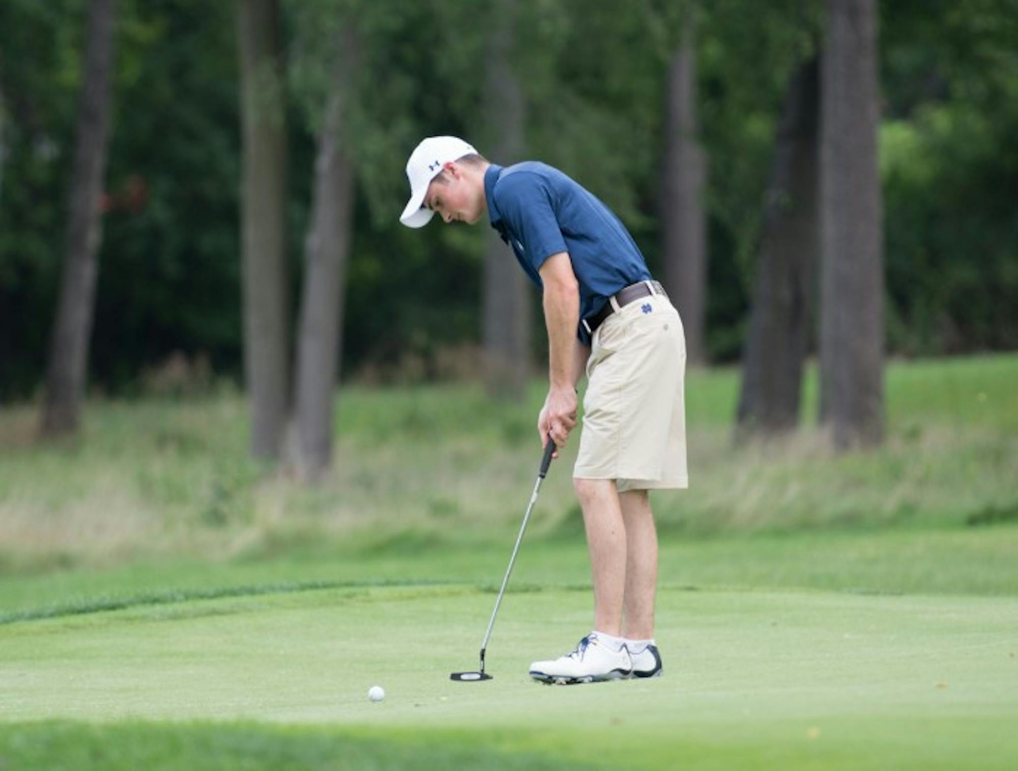Irish sophomore Liam Cox lines up a putt during the Notre Dame Kickoff Challenge on Aug. 31 at Warren Golf Course.