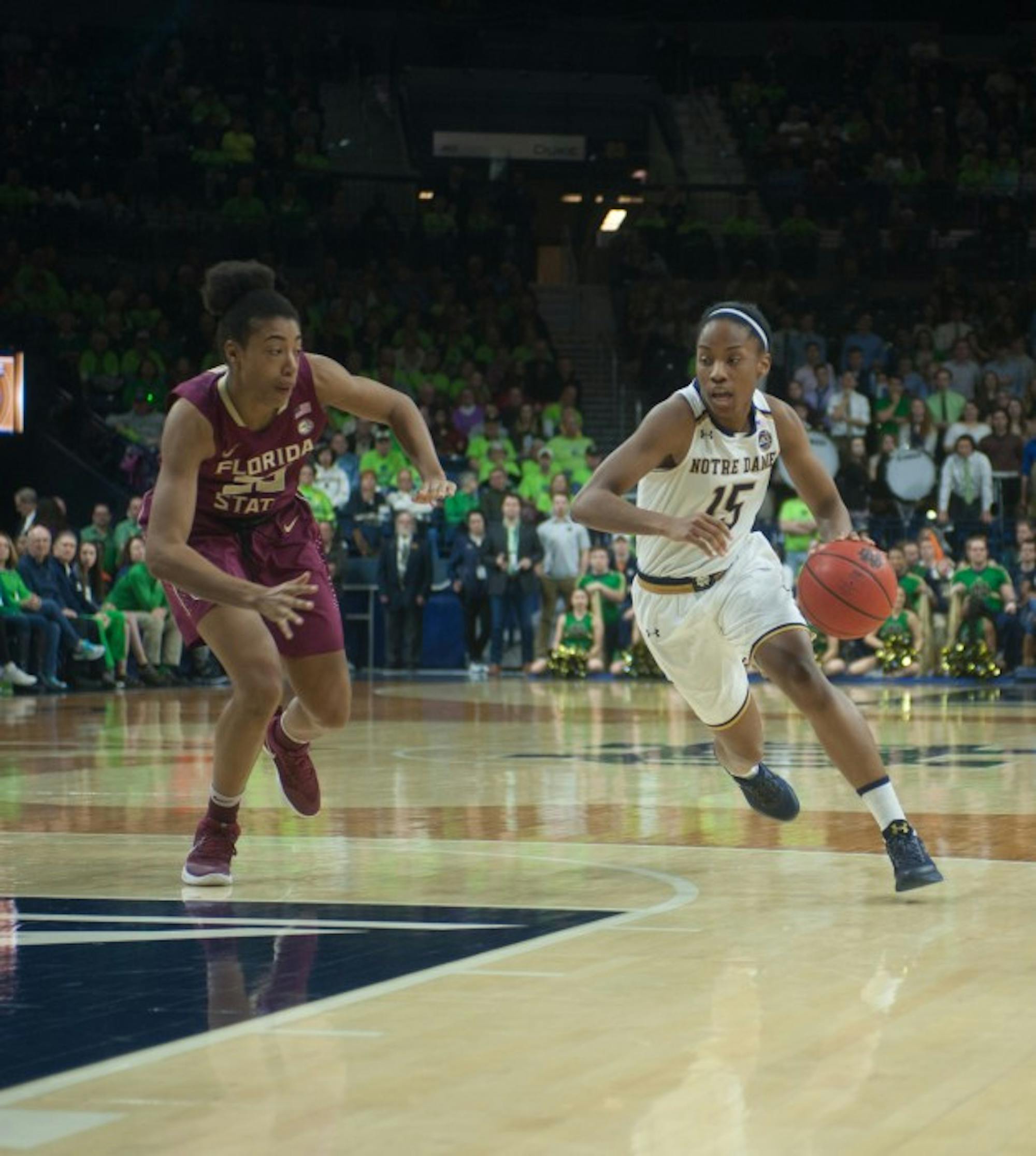 Irish senior guard Lindsay Allen dribbles the ball up court during Notre Dame's 79-61 victory over Florida State on Sunday afternoon at Purcell Pavilion.