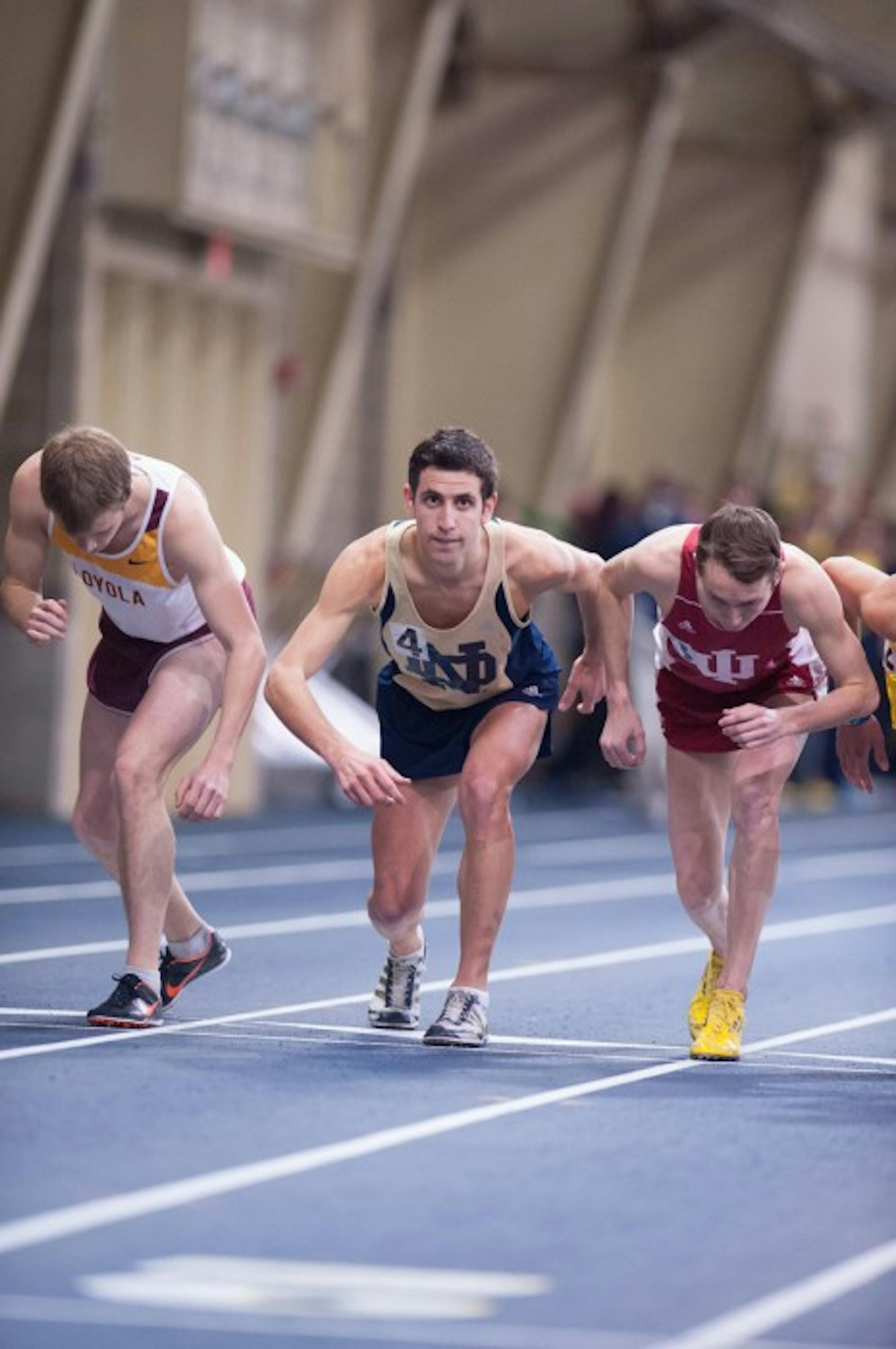 ZACH LLORENS | The Observer Fifth-year student Jeremy Rae takes his mark at the Meyo  Invitational on Feb. 8.  Rae won the Meyo Mile for the Irish.
