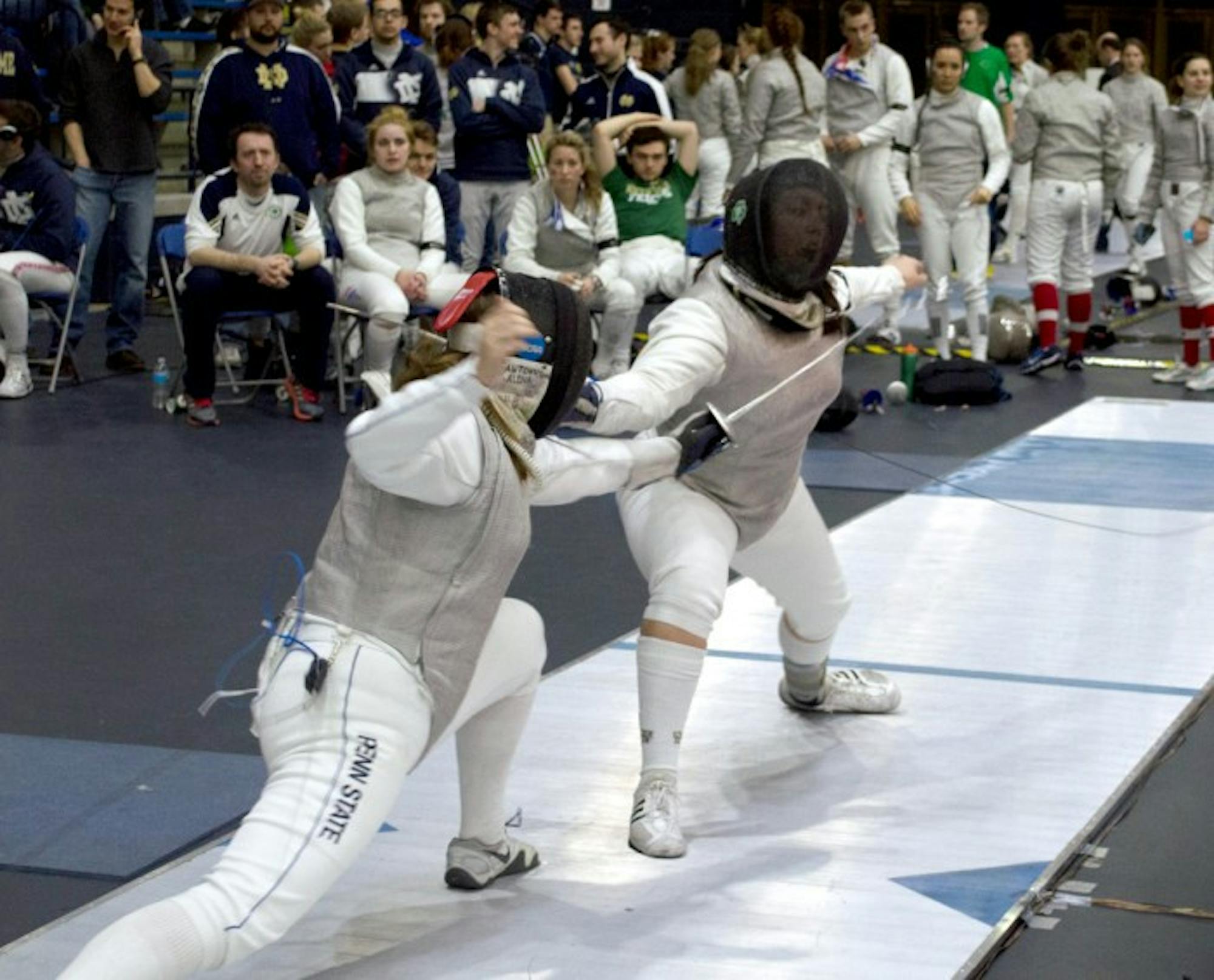 Junior foilist Nicole McKee  competes in the DeCicco Duals at the Castellen Fencing Family Center  on Feb. 8.
