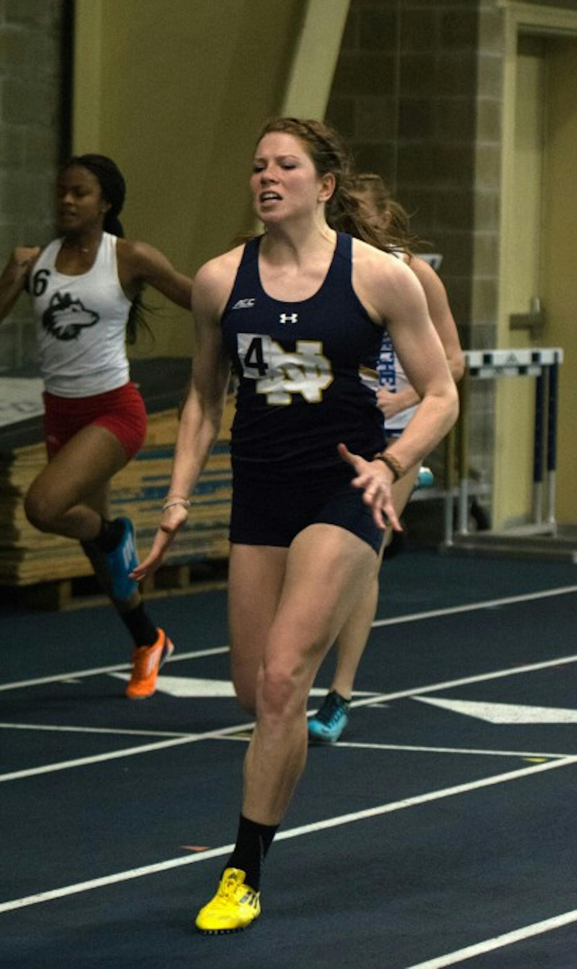 Irish sophomore Emily Carter powers through the line during a heat of the 60-meter sprint of the Blue and Gold Invitational at Loftus Sports Center. Carter finished sixth in the final.