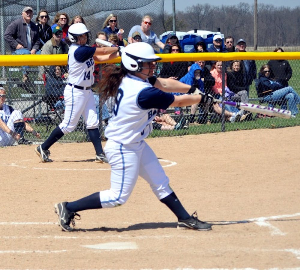 Saint Mary's sophomore outfielder Sarah Callis swings at a pitch during the Belles' 3-2 over Adrian on April 19.