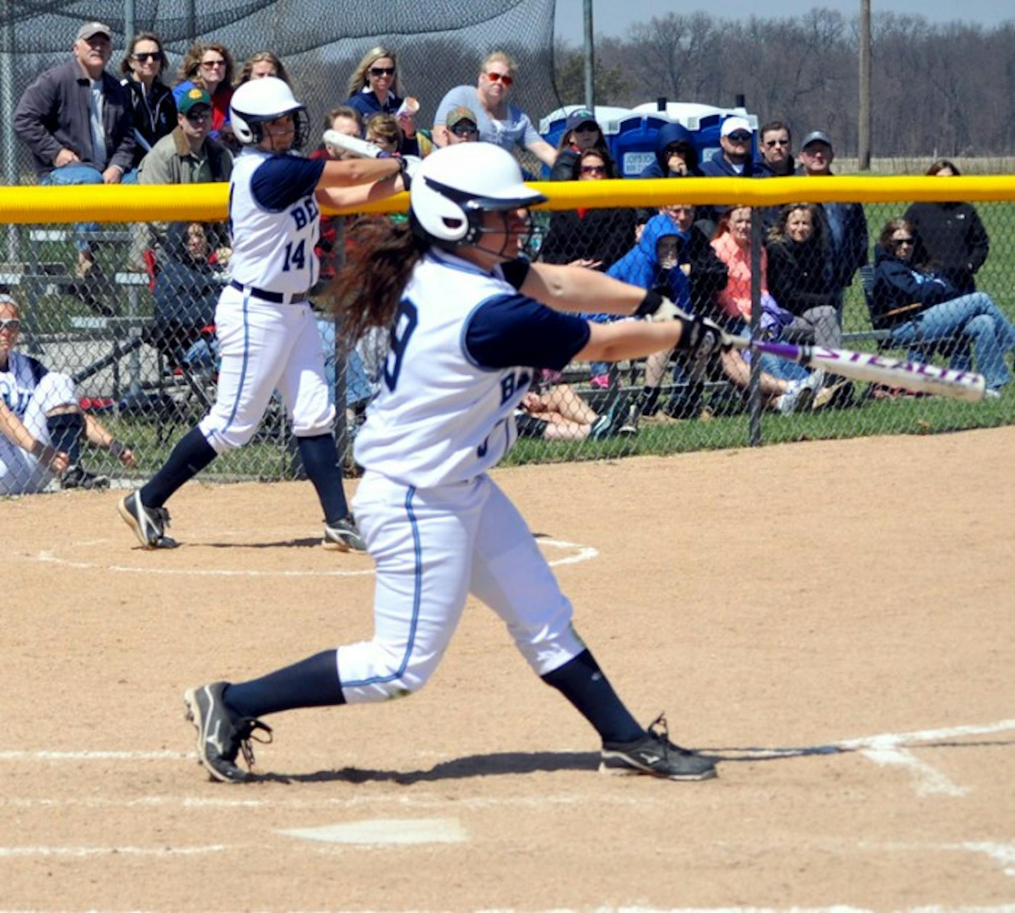 Saint Mary's sophomore outfielder Sarah Callis swings at a pitch during the Belles' 3-2 over Adrian on April 19.