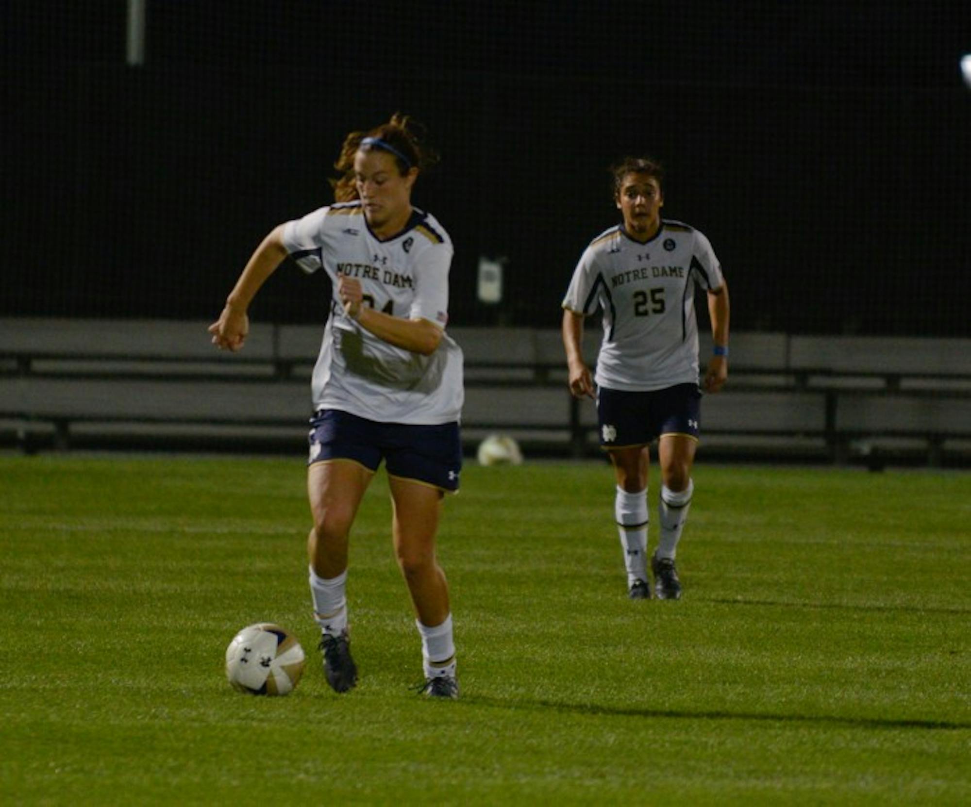 Irish senior defender and captain Katie Naughton dribbles up the field during Notre Dame’s 2-1 win over Santa Clara on Aug. 28.Irish senior defender and captain Katie Naughton dribbles up the field during Notre Dame’s 2-1 win over Santa Clara on Aug. 28.